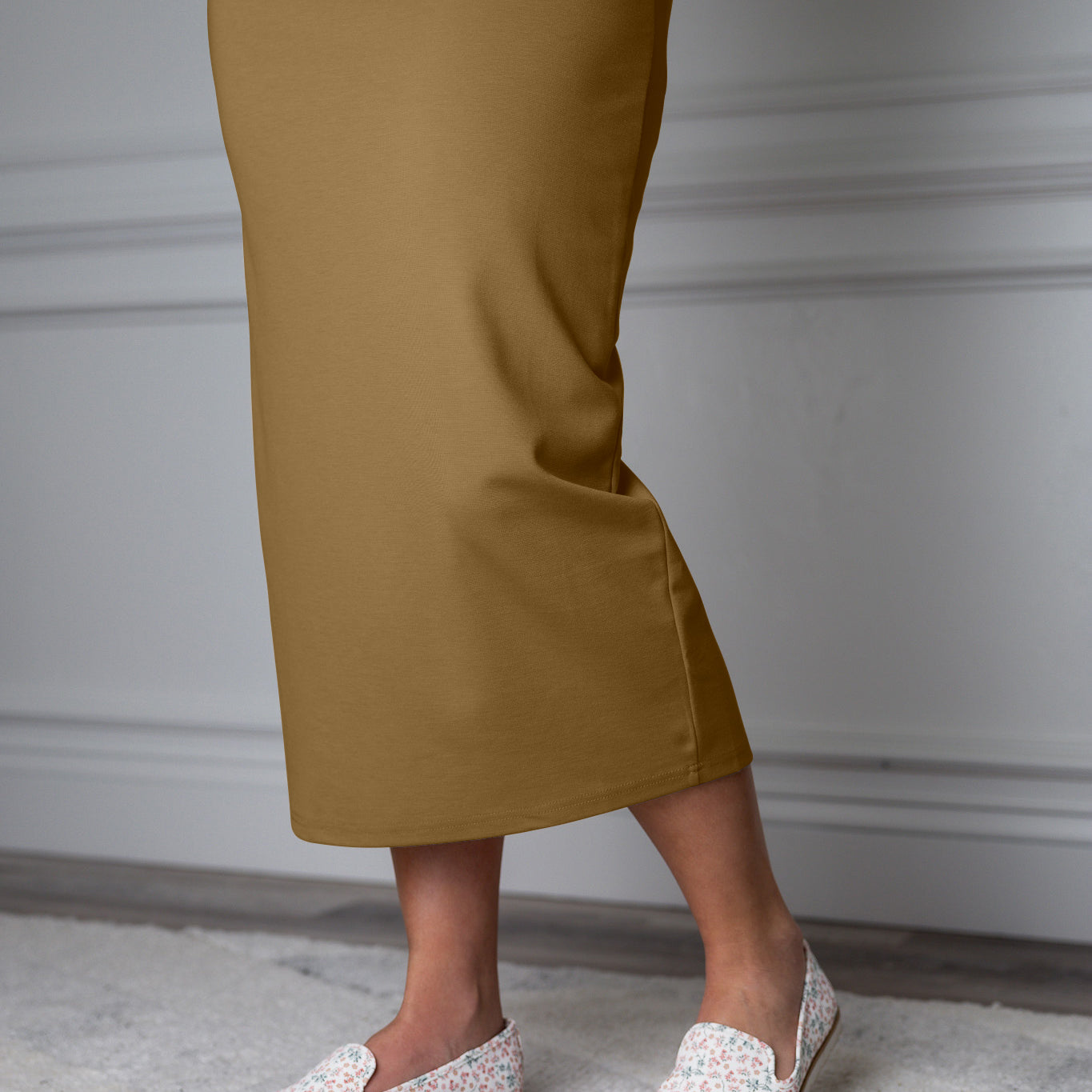 31"Modest knit midi skirt with elastic waistband, available in various colors and lengths—27, 31, and 34 inches.