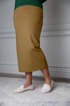 31"Modest knit midi skirt with elastic waistband, available in various colors and lengths—27, 31, and 34 inches.
