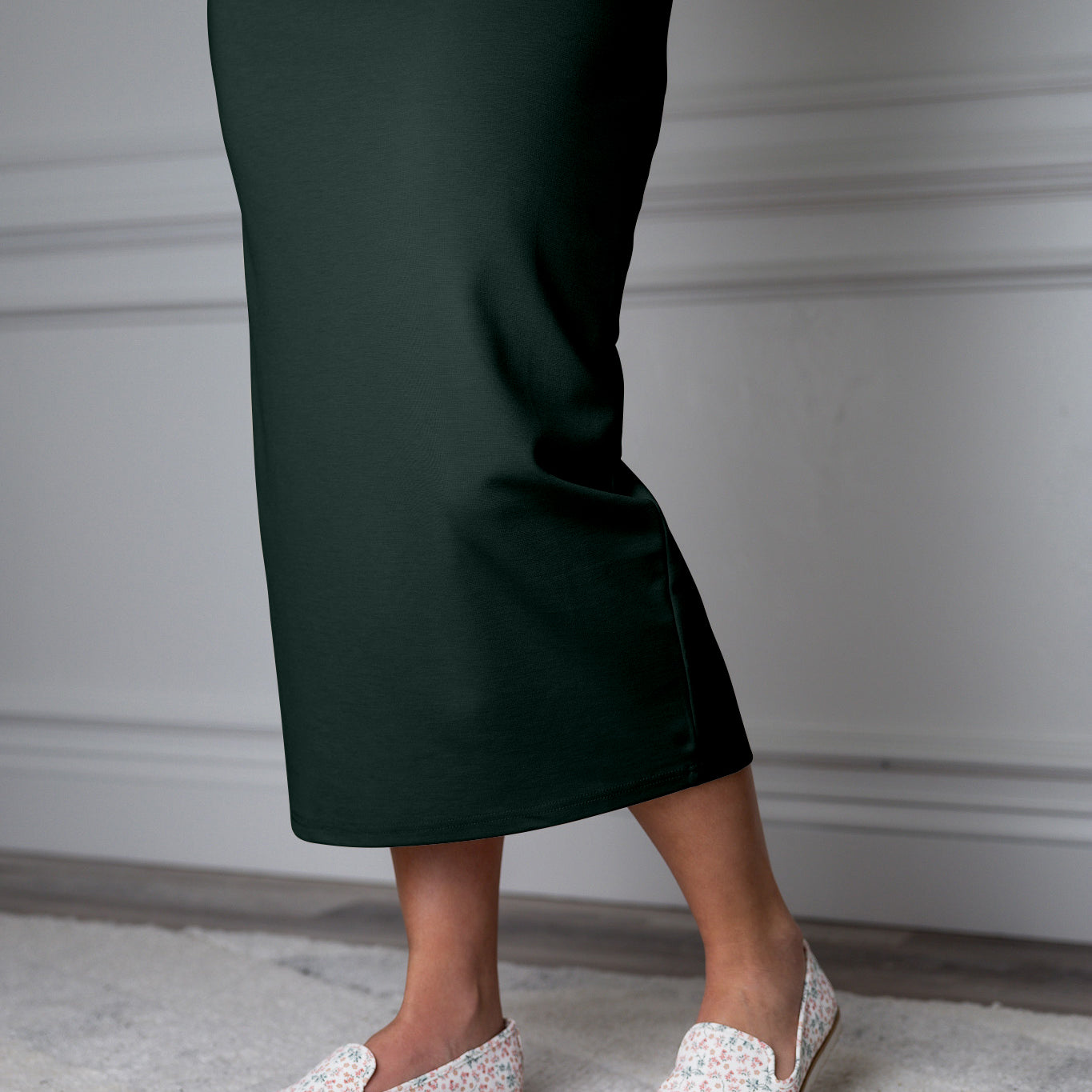 31"Modest knit midi skirt with elastic waistband, available in various colors and lengths—27, 31, and 34 inches.