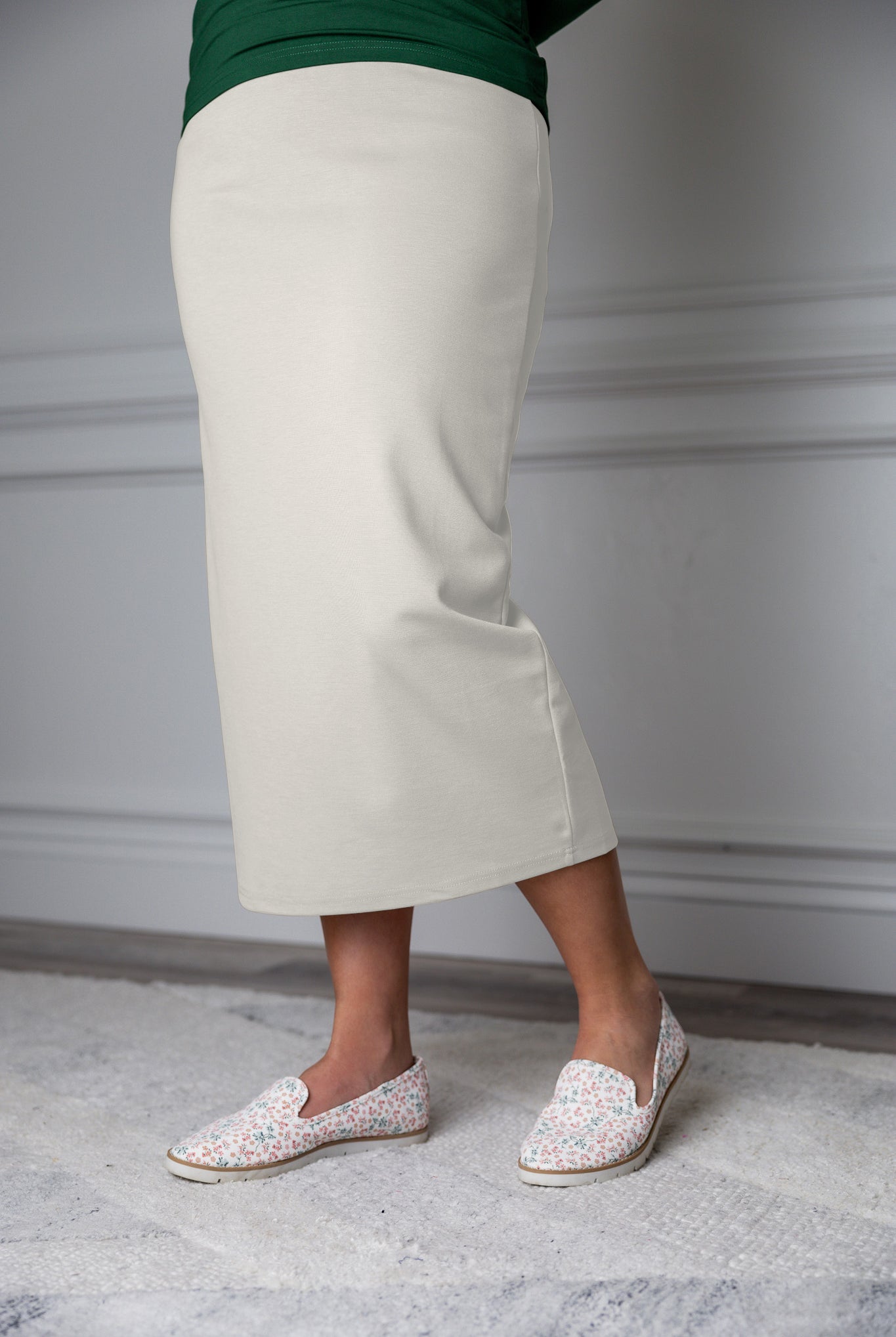 31"Modest knit midi skirt with elastic waistband, available in various colors and lengths—27, 31, and 34 inches.