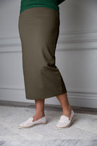 31"Modest knit midi skirt with elastic waistband, available in various colors and lengths—27, 31, and 34 inches.