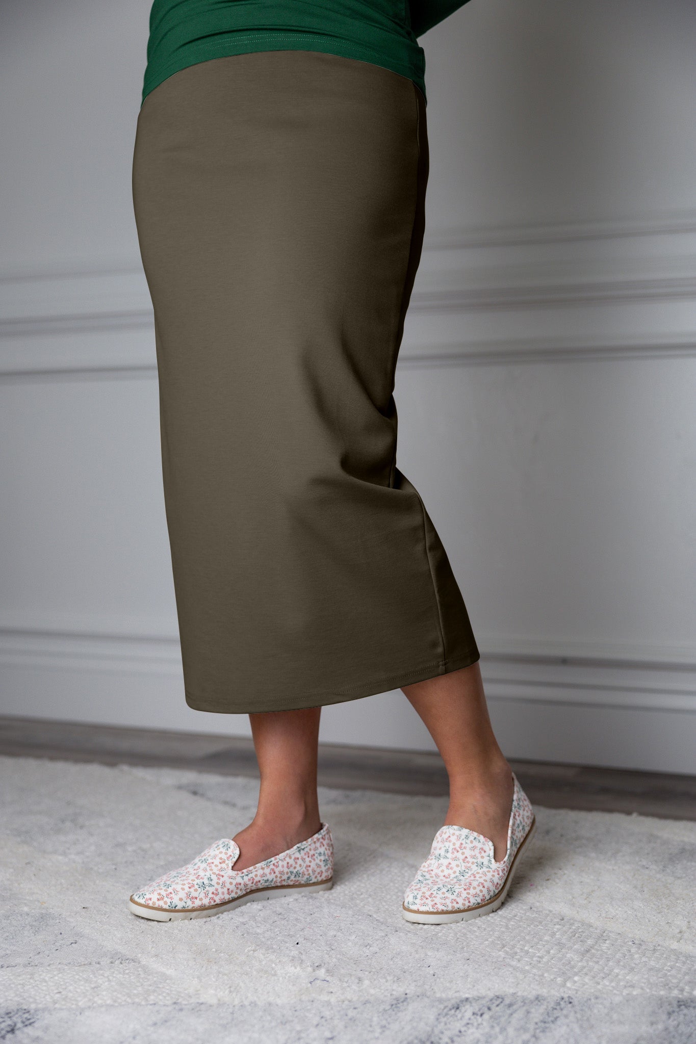 31"Modest knit midi skirt with elastic waistband, available in various colors and lengths—27, 31, and 34 inches.