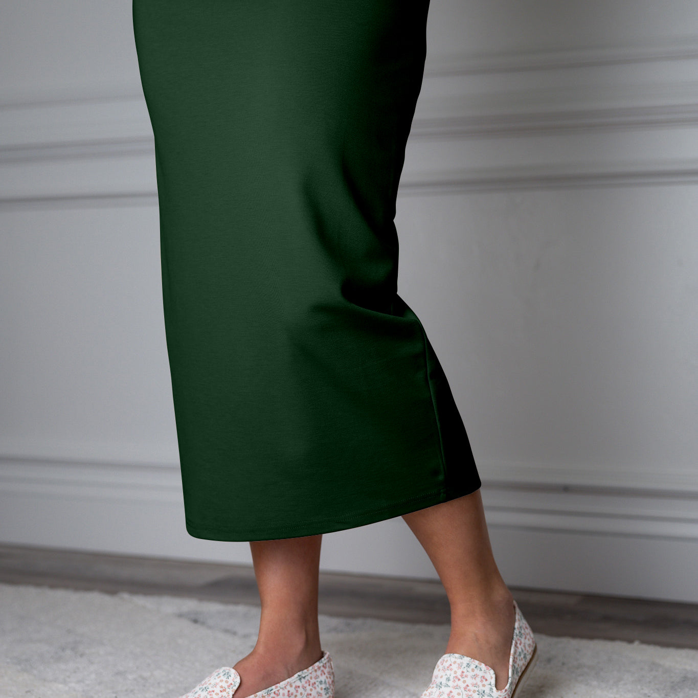 31"Modest knit midi skirt with elastic waistband, available in various colors and lengths—27, 31, and 34 inches.