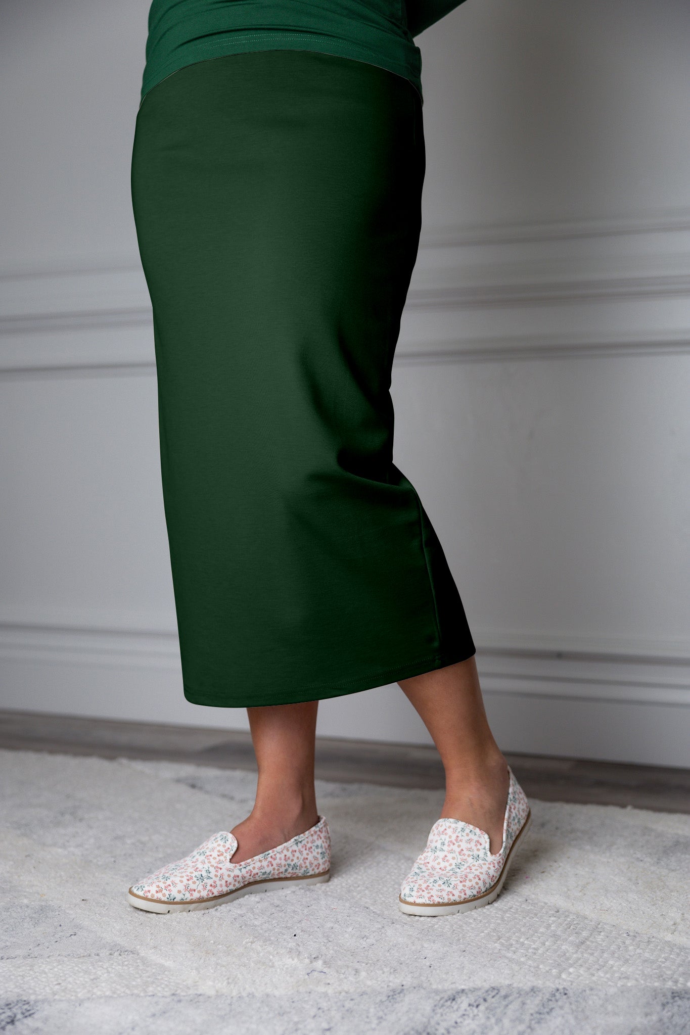 31"Modest knit midi skirt with elastic waistband, available in various colors and lengths—27, 31, and 34 inches.
