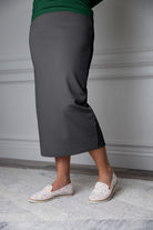 31"Modest knit midi skirt with elastic waistband, available in various colors and lengths—27, 31, and 34 inches.