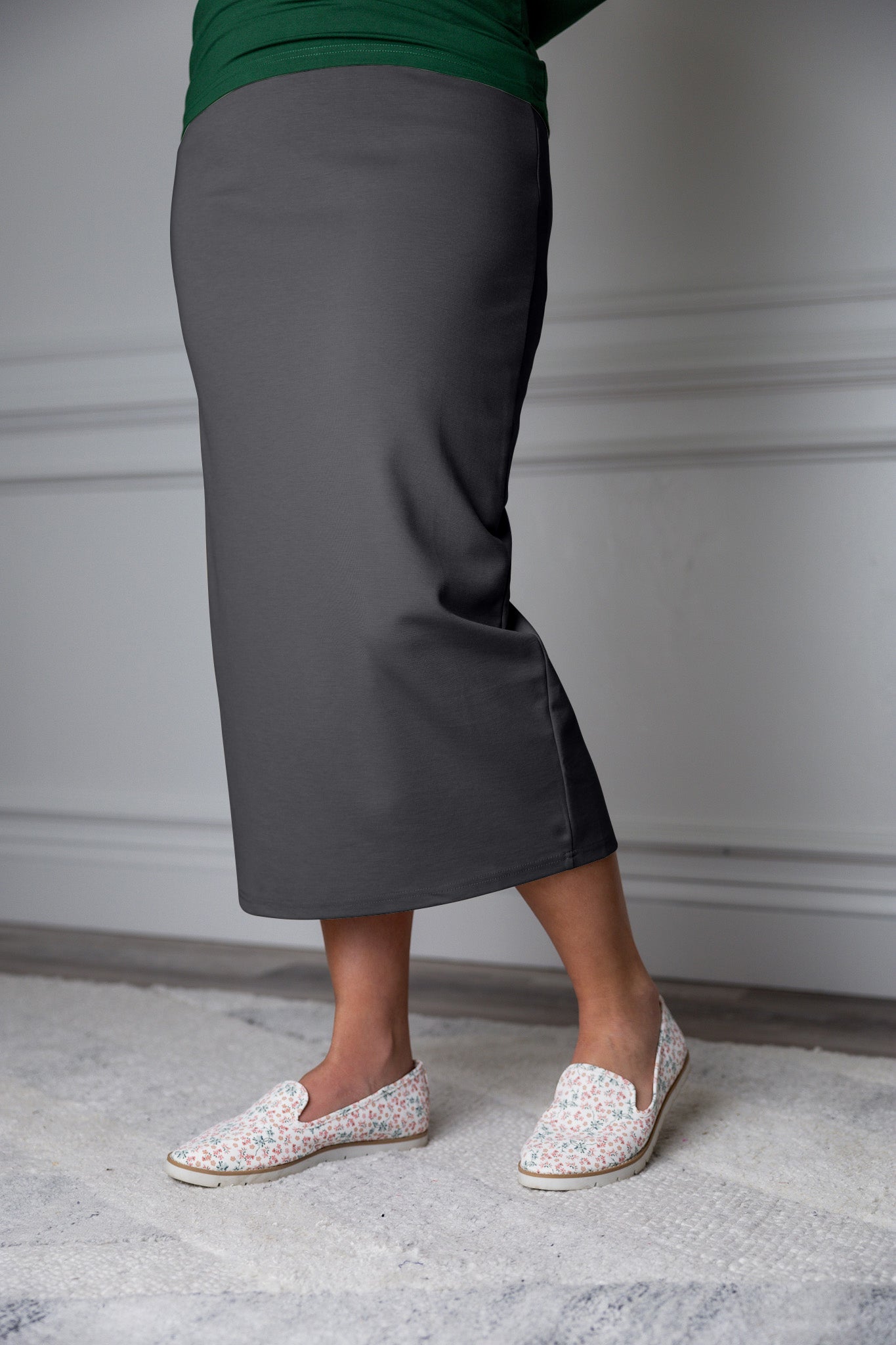 31"Modest knit midi skirt with elastic waistband, available in various colors and lengths—27, 31, and 34 inches.