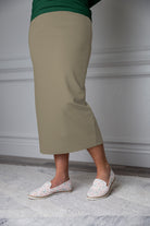 31"Modest knit midi skirt with elastic waistband, available in various colors and lengths—27, 31, and 34 inches.