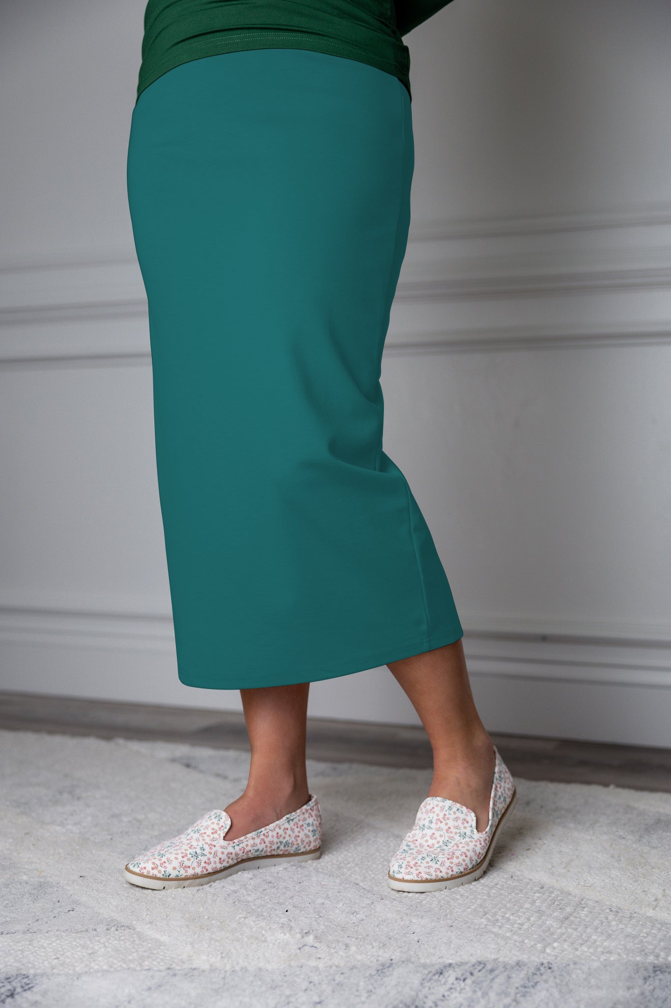 31"Modest knit midi skirt with elastic waistband, available in various colors and lengths—27, 31, and 34 inches.