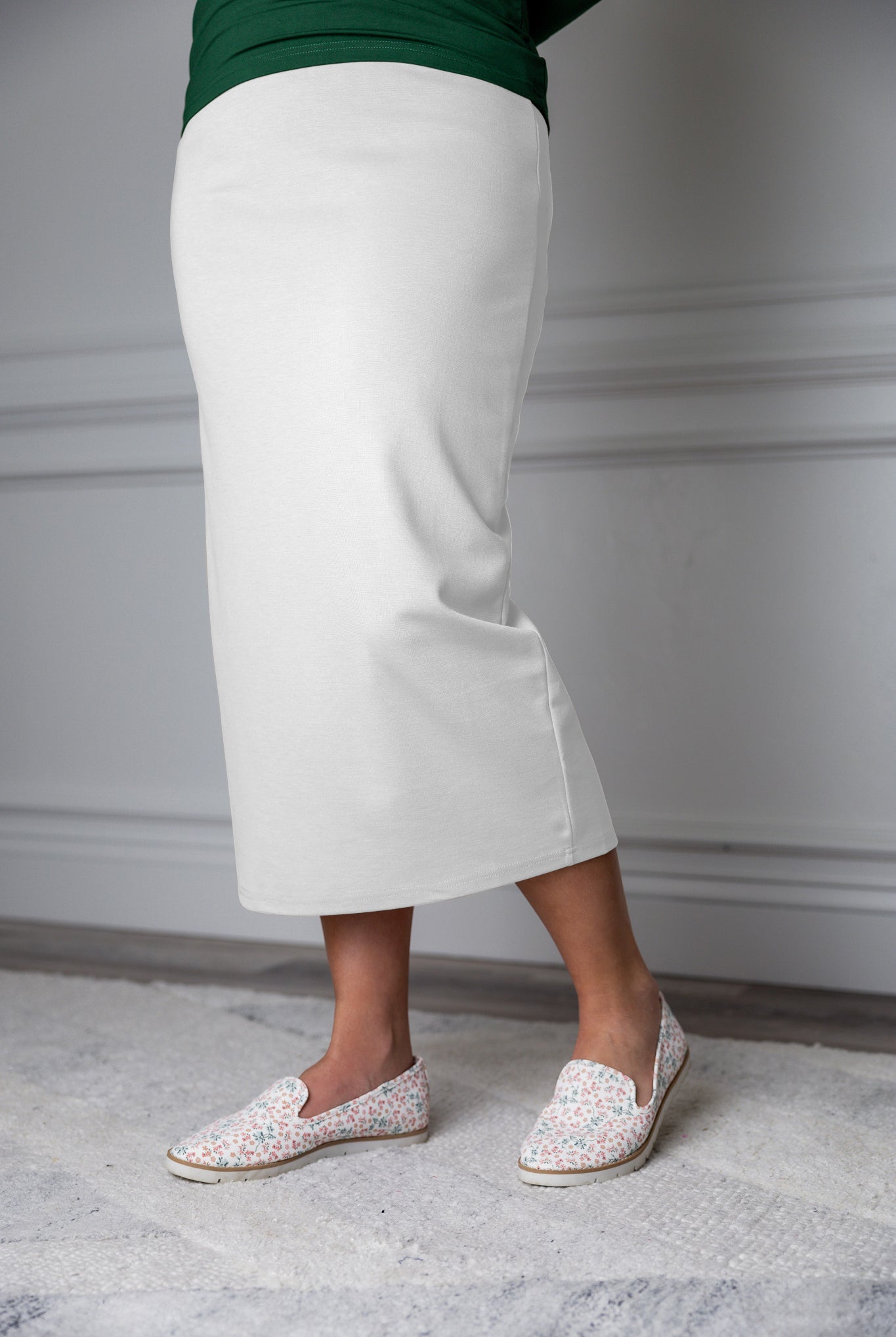 31"Modest knit midi skirt with elastic waistband, available in various colors and lengths—27, 31, and 34 inches.