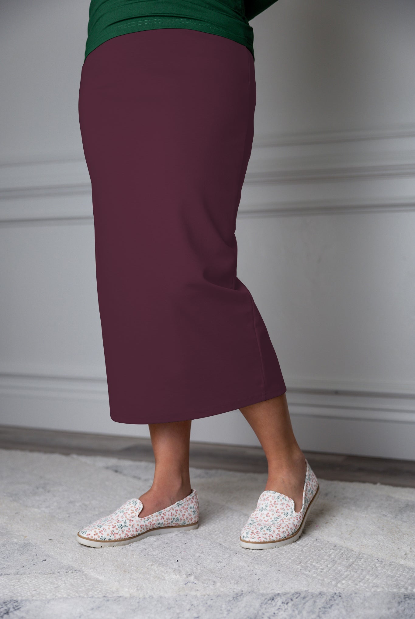 31"Modest knit midi skirt with elastic waistband, available in various colors and lengths—27, 31, and 34 inches.