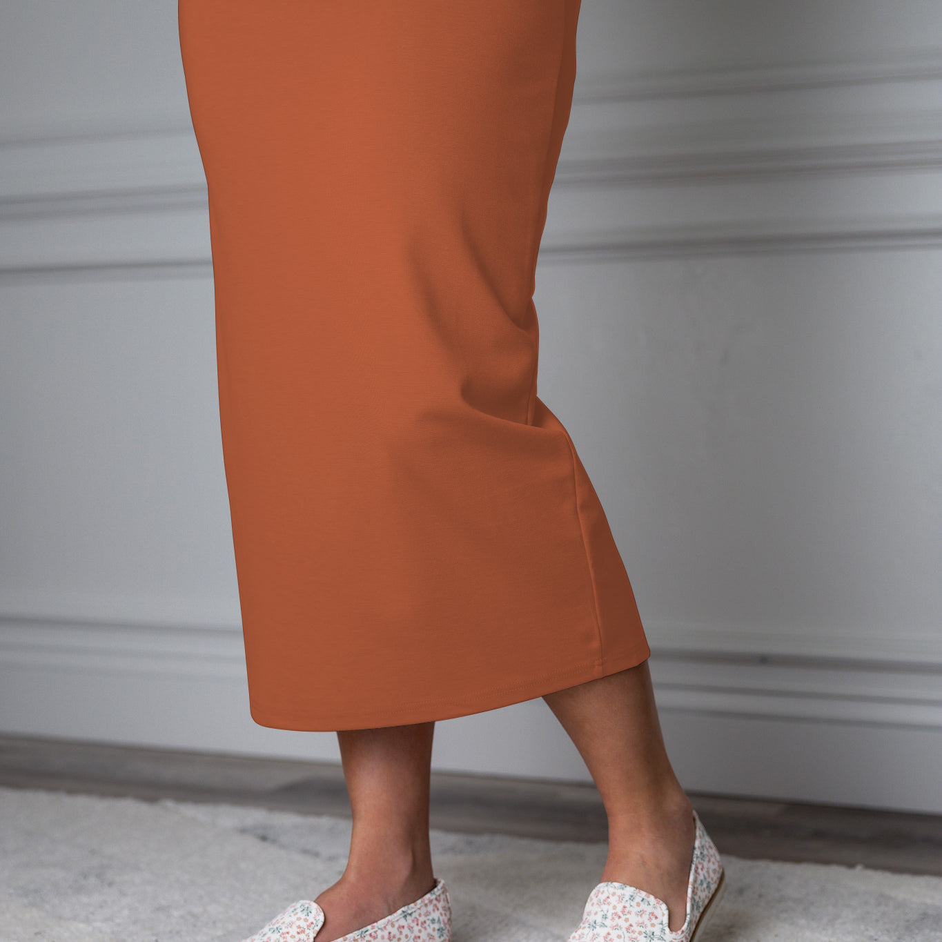 31"Modest knit midi skirt with elastic waistband, available in various colors and lengths—27, 31, and 34 inches.