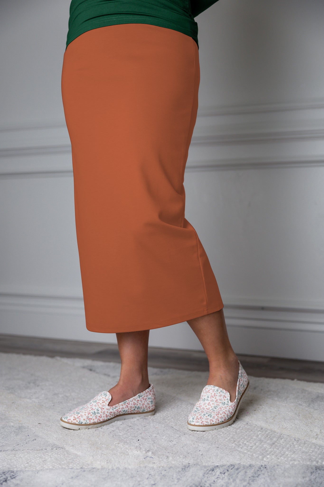 31"Modest knit midi skirt with elastic waistband, available in various colors and lengths—27, 31, and 34 inches.