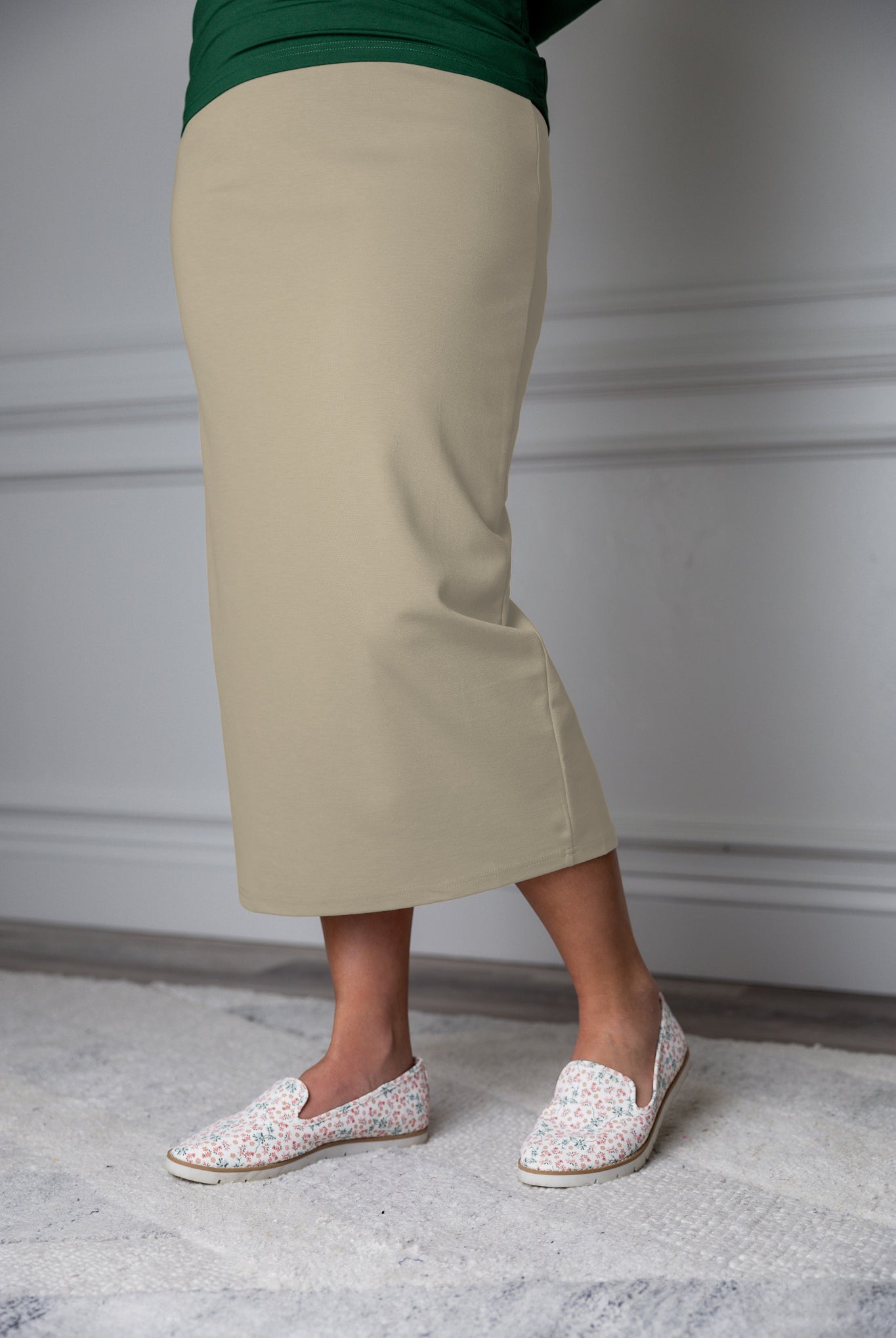 31"Modest knit midi skirt with elastic waistband, available in various colors and lengths—27, 31, and 34 inches.