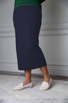31"Modest knit midi skirt with elastic waistband, available in various colors and lengths—27, 31, and 34 inches.