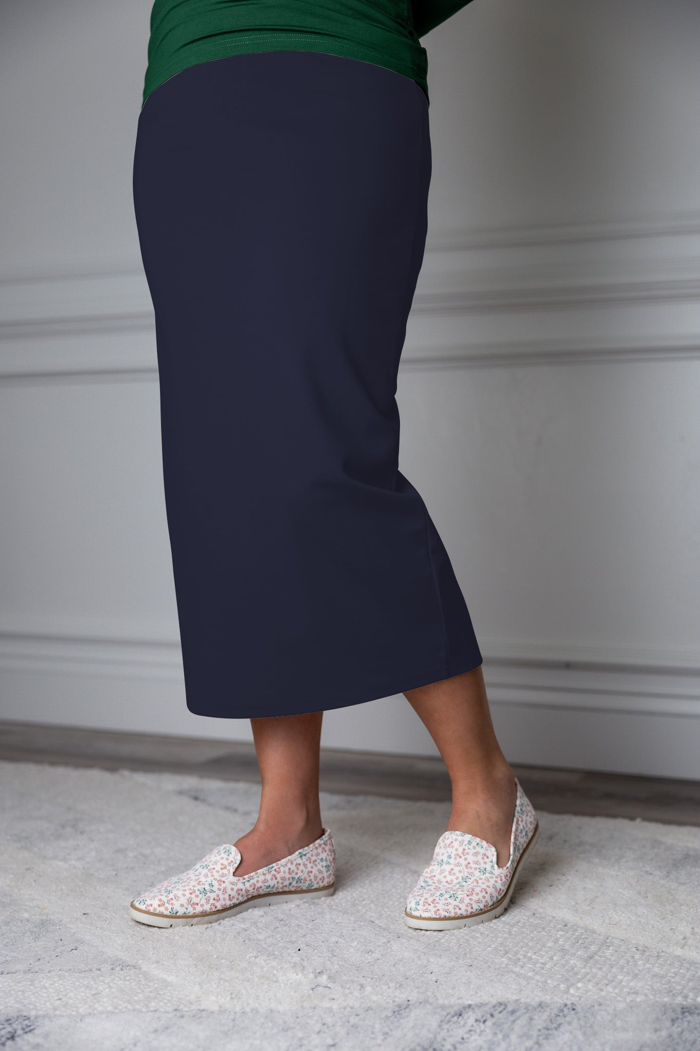 31"Modest knit midi skirt with elastic waistband, available in various colors and lengths—27, 31, and 34 inches.