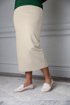 31"Modest knit midi skirt with elastic waistband, available in various colors and lengths—27, 31, and 34 inches.