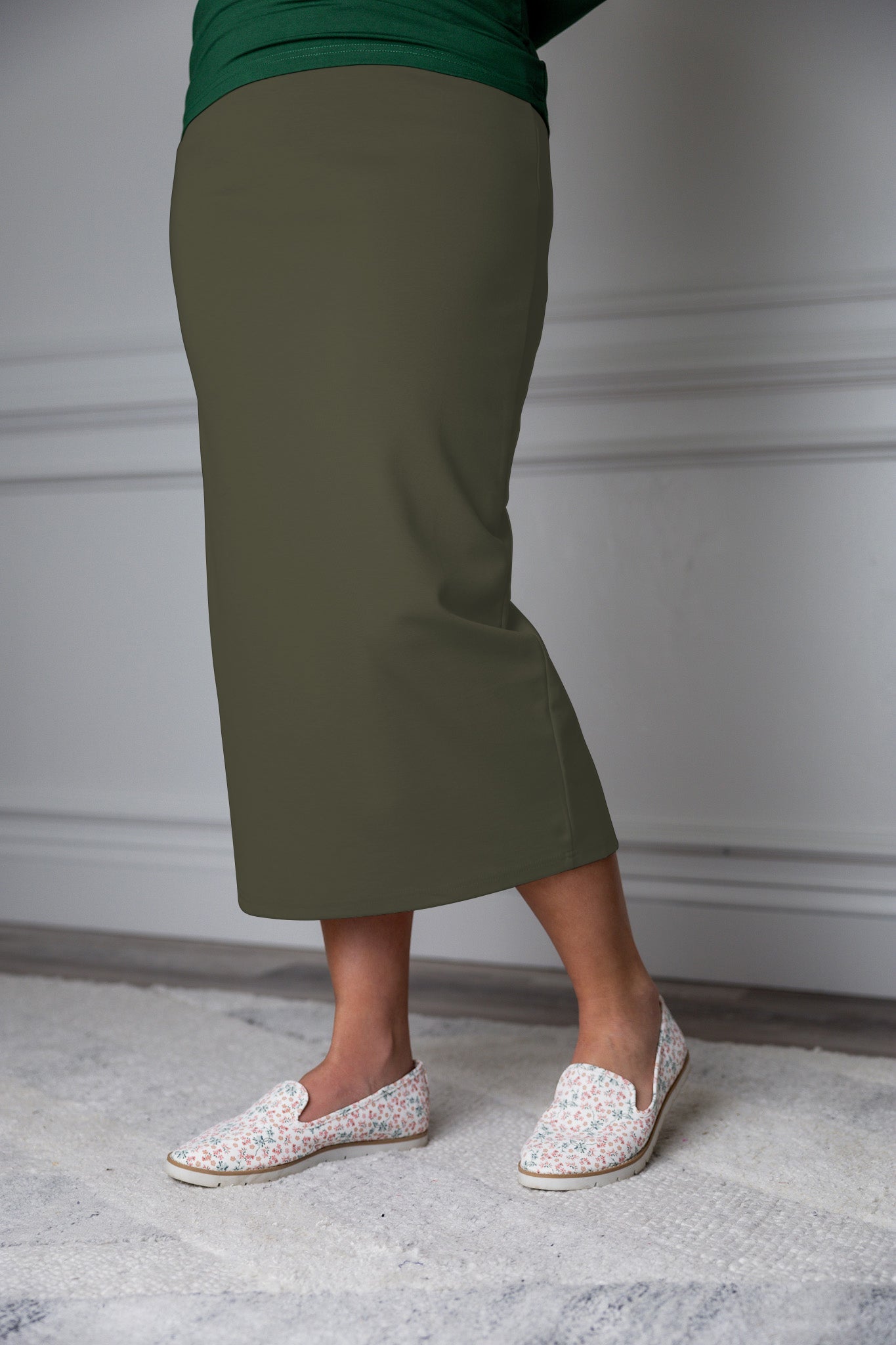 31"Modest knit midi skirt with elastic waistband, available in various colors and lengths—27, 31, and 34 inches.