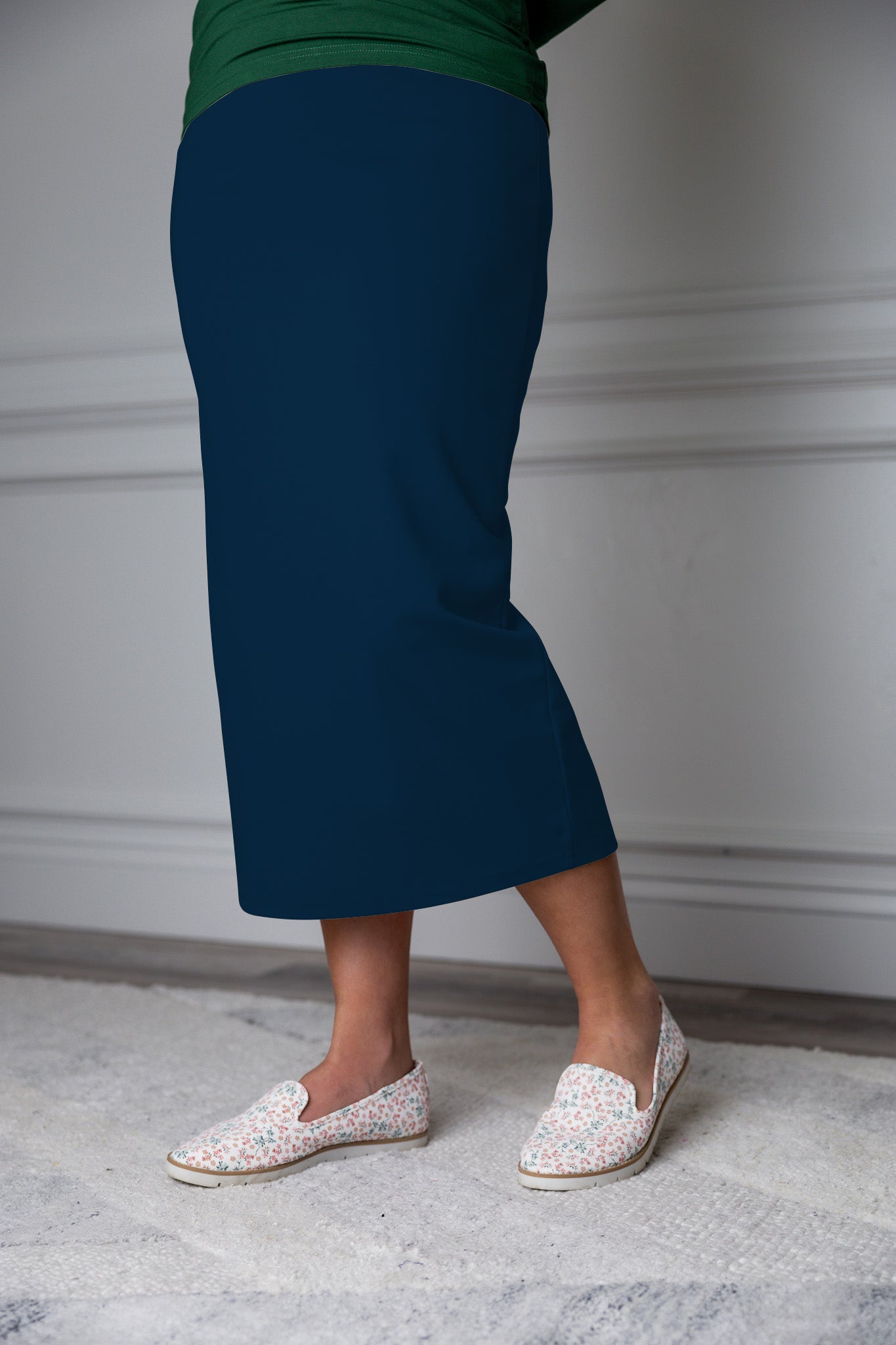 31"Modest knit midi skirt with elastic waistband, available in various colors and lengths—27, 31, and 34 inches.