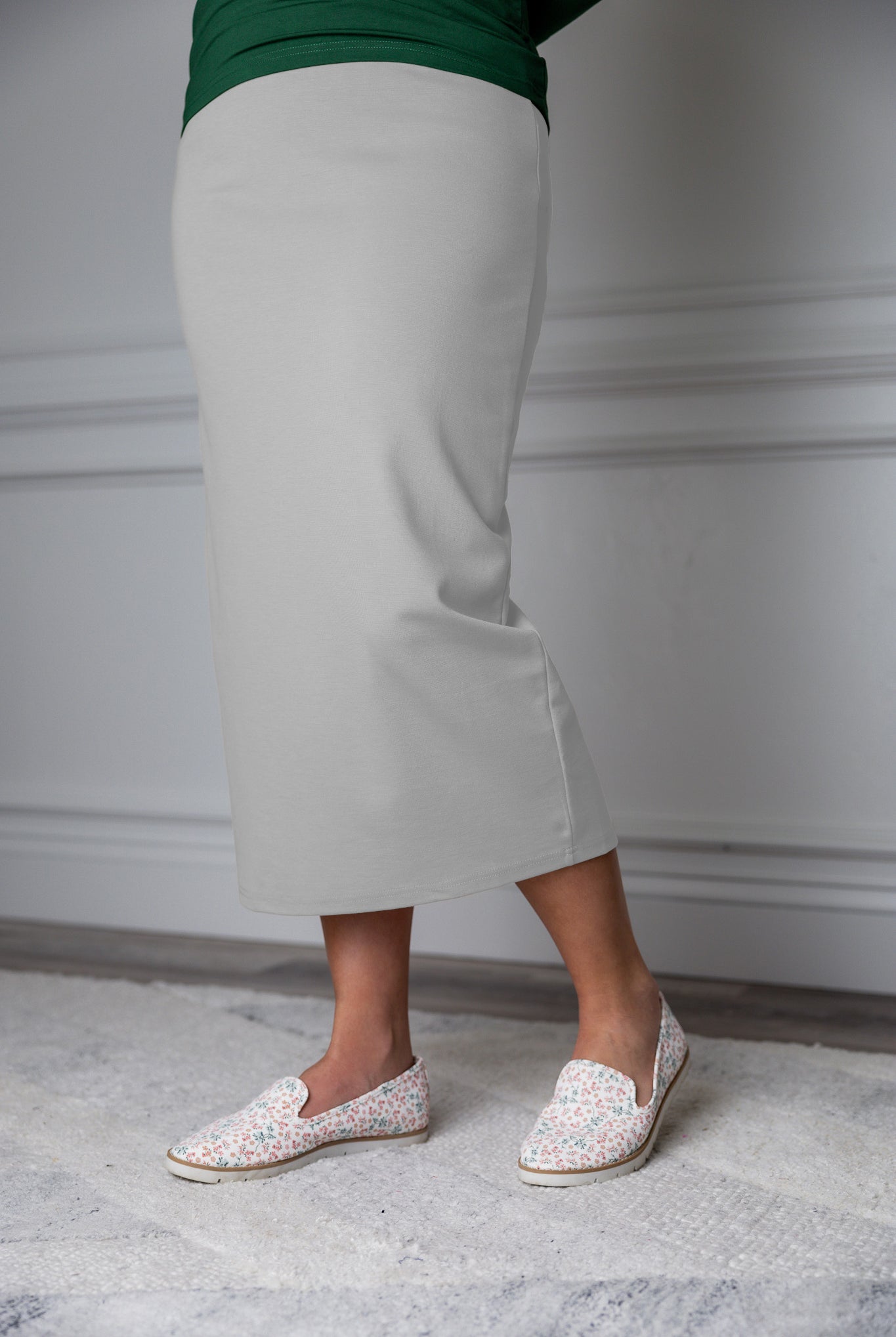 31"Modest knit midi skirt with elastic waistband, available in various colors and lengths—27, 31, and 34 inches.