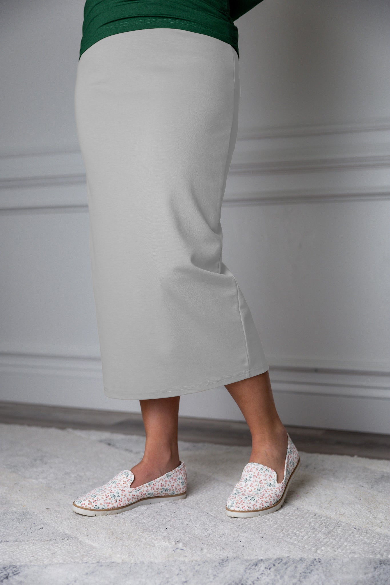 31"Modest knit midi skirt with elastic waistband, available in various colors and lengths—27, 31, and 34 inches.