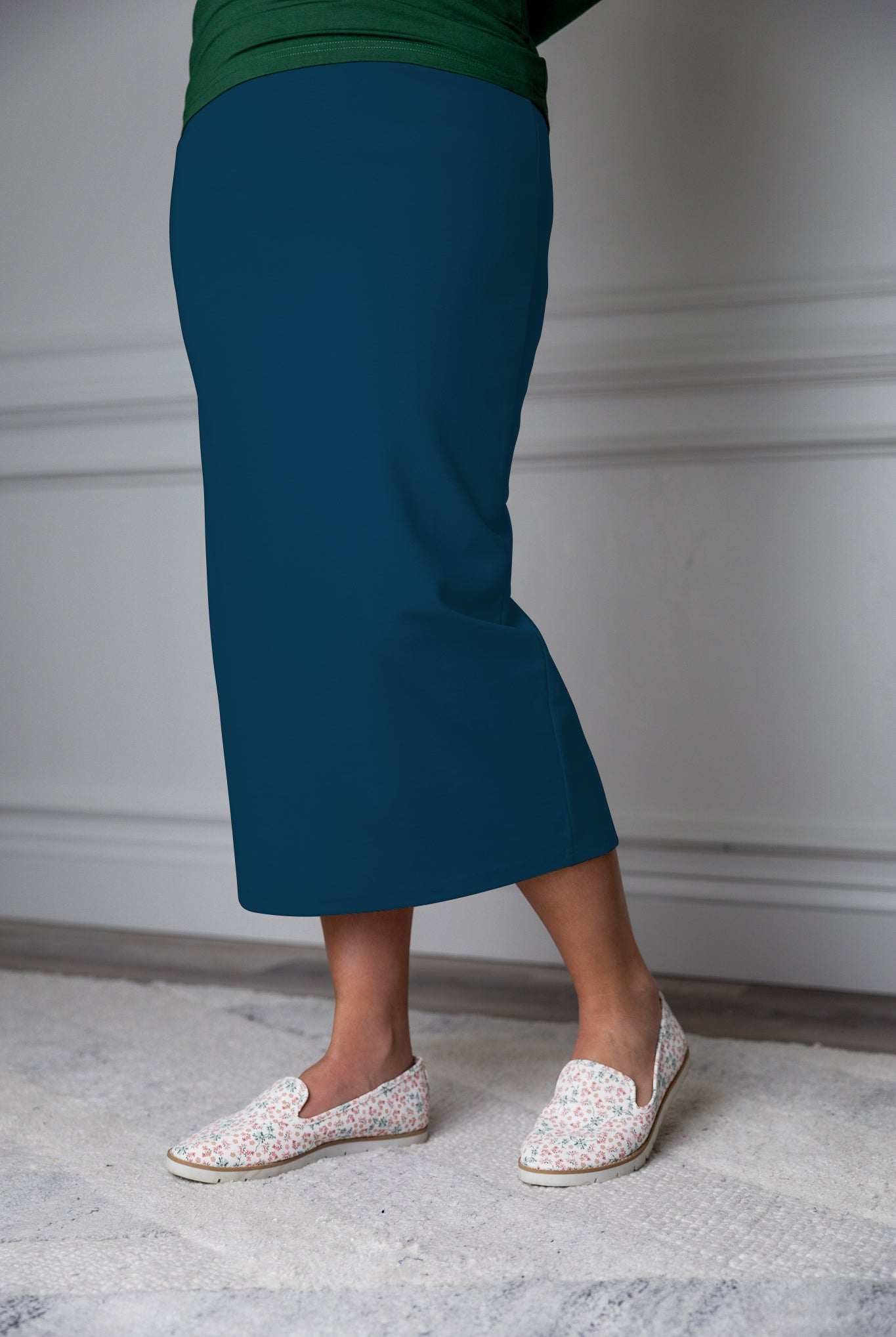31"Modest knit midi skirt with elastic waistband, available in various colors and lengths—27, 31, and 34 inches.