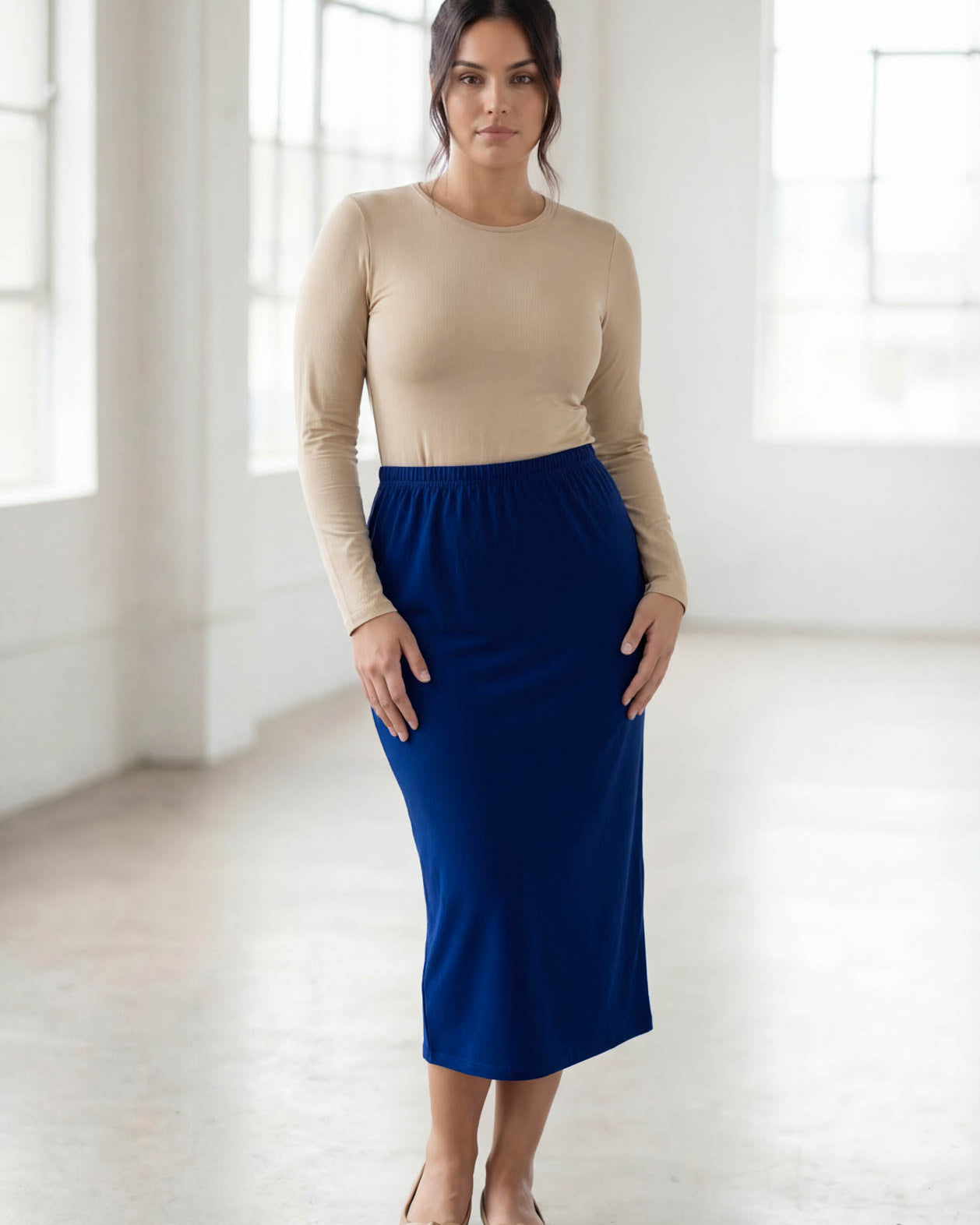 Model wearing Nuggles® 31" Classic Skirt in Dark Royal