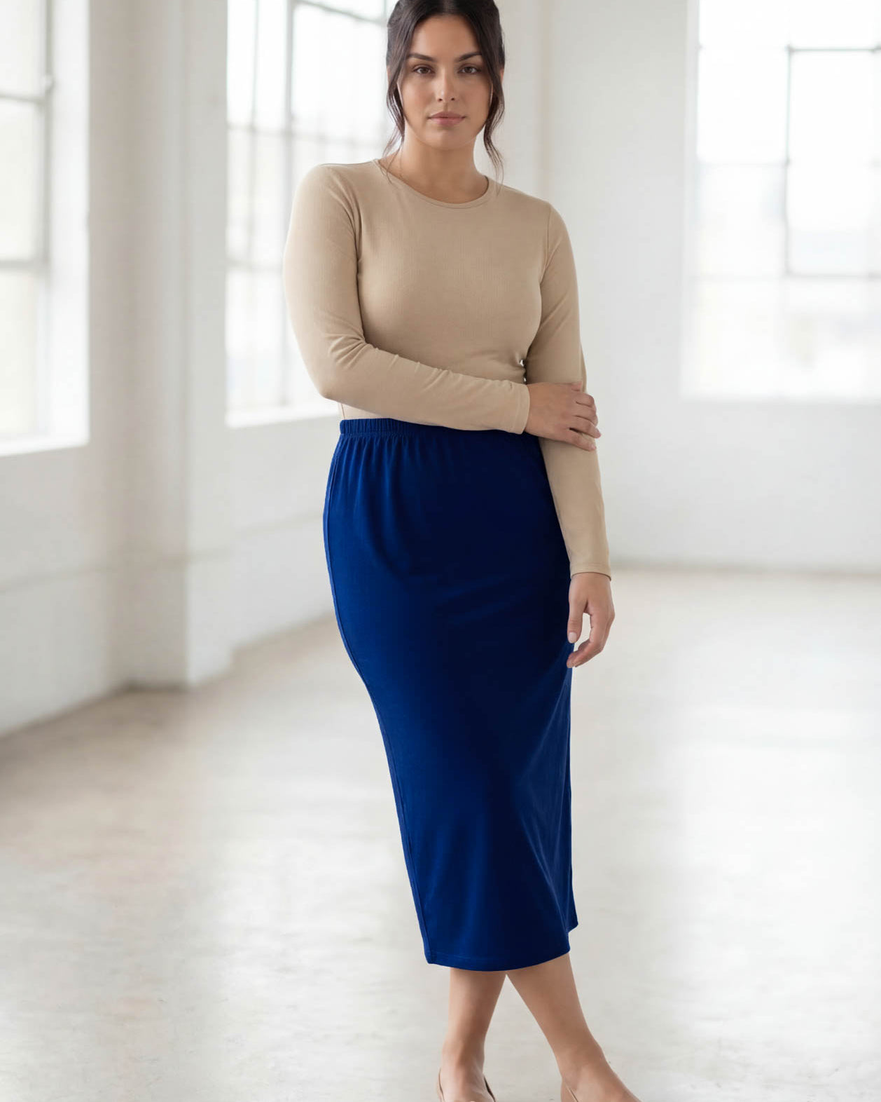 Model wearing Nuggles® 31" Classic Skirt in Dark Royal