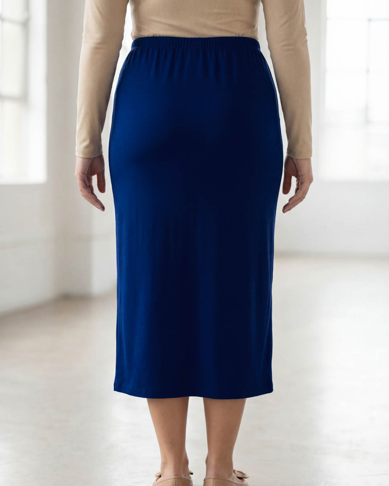 Model wearing Nuggles® 31" Classic Skirt in Dark Royal