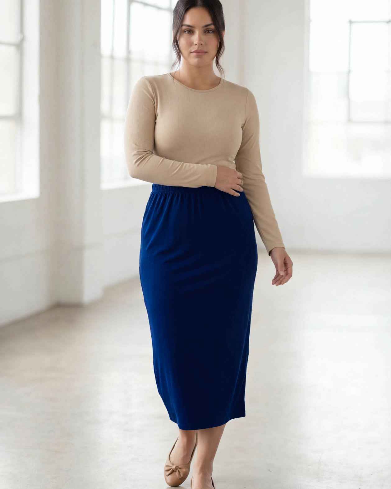 Model wearing Nuggles® 31" Classic Skirt in Dark Royal