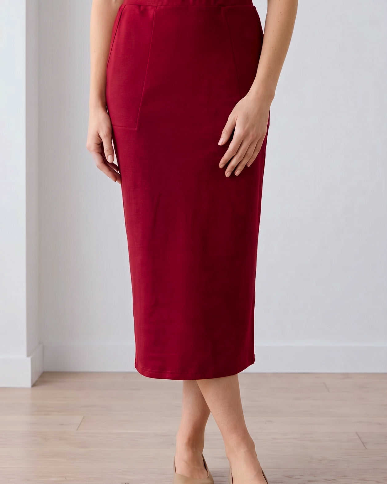 Model wearing Nuggles® 31" Pocket Classic Skirt in Dark Brick