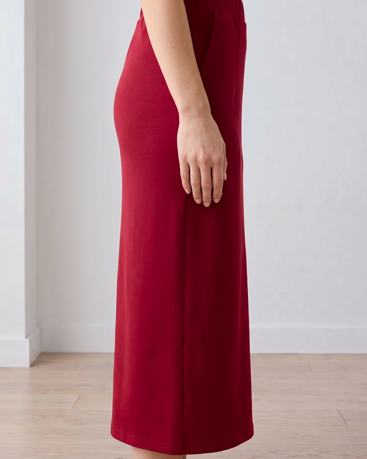 Model wearing Nuggles® 31" Pocket Classic Skirt in Dark Brick