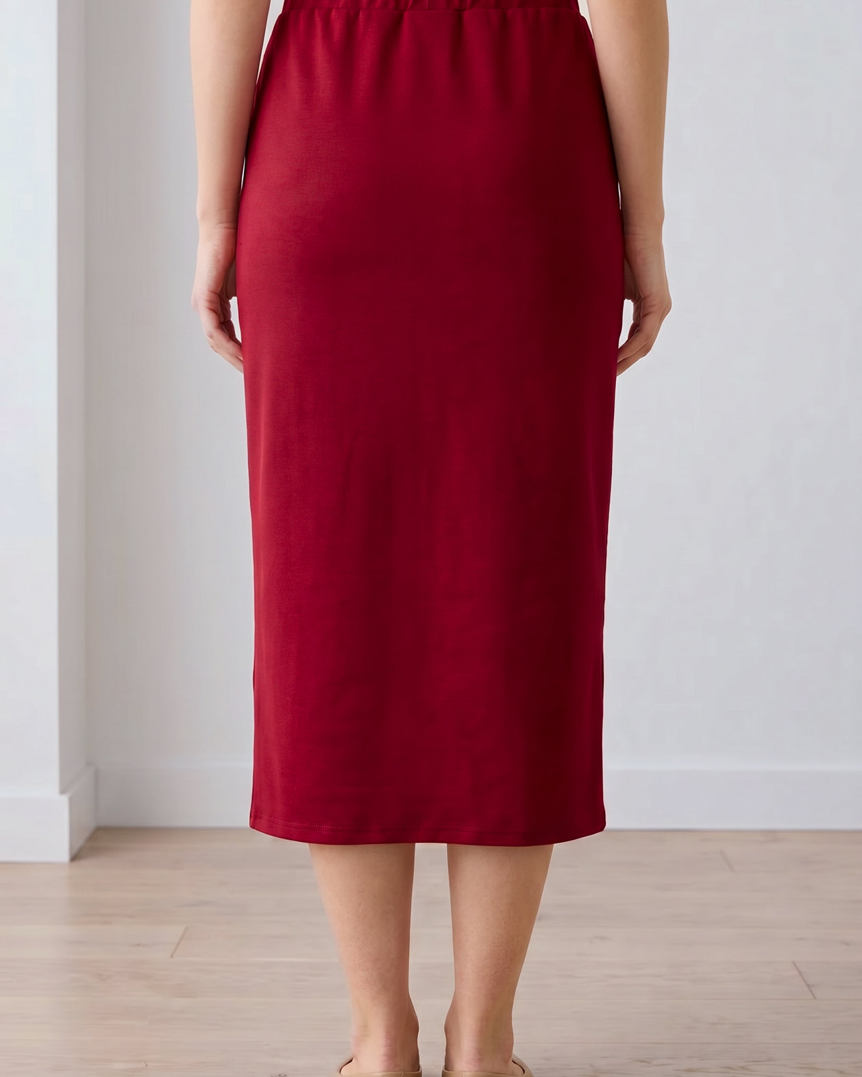 Model wearing Nuggles® 31" Pocket Classic Skirt in Dark Brick