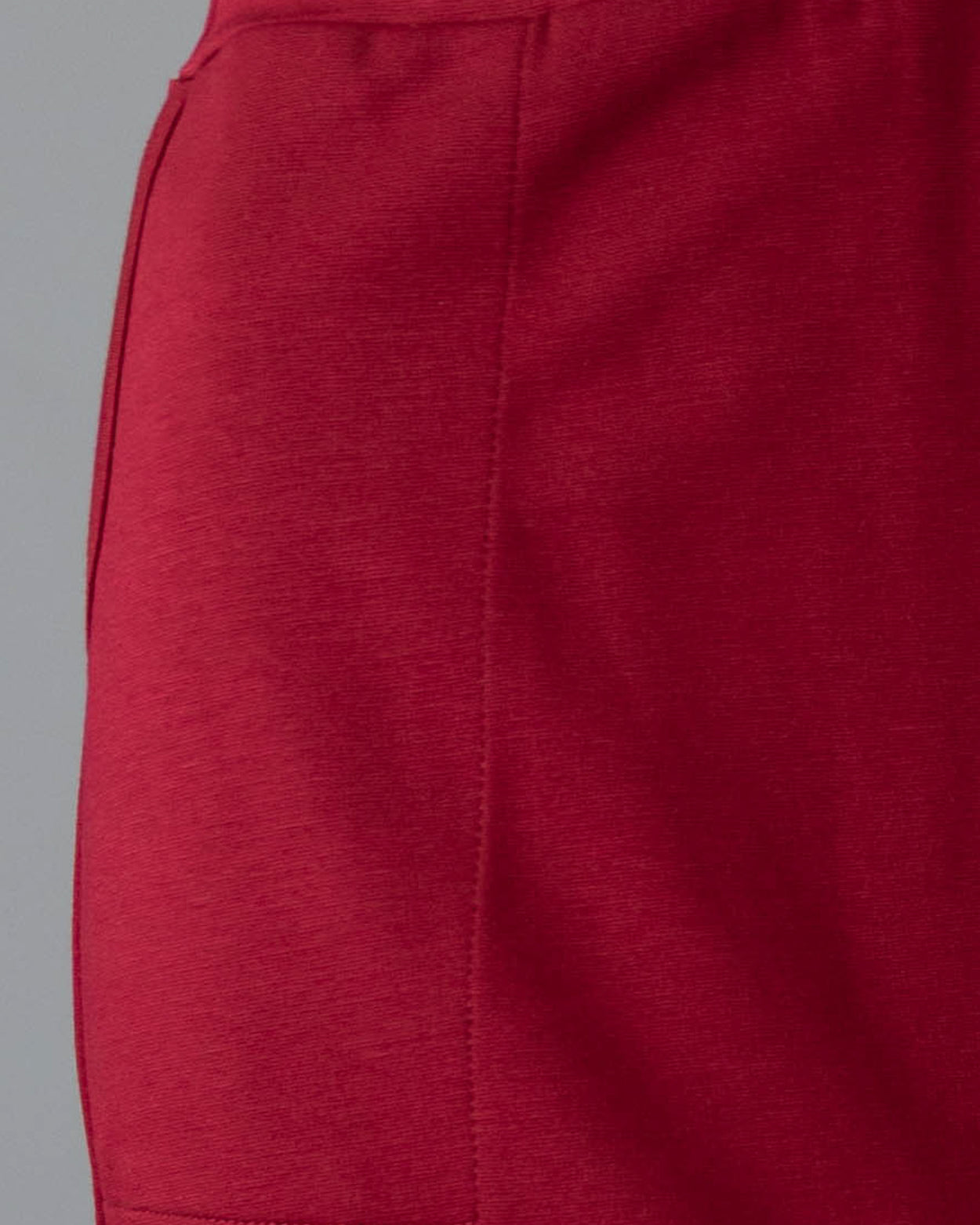 Model wearing Nuggles® 31" Pocket Classic Skirt in Dark Brick