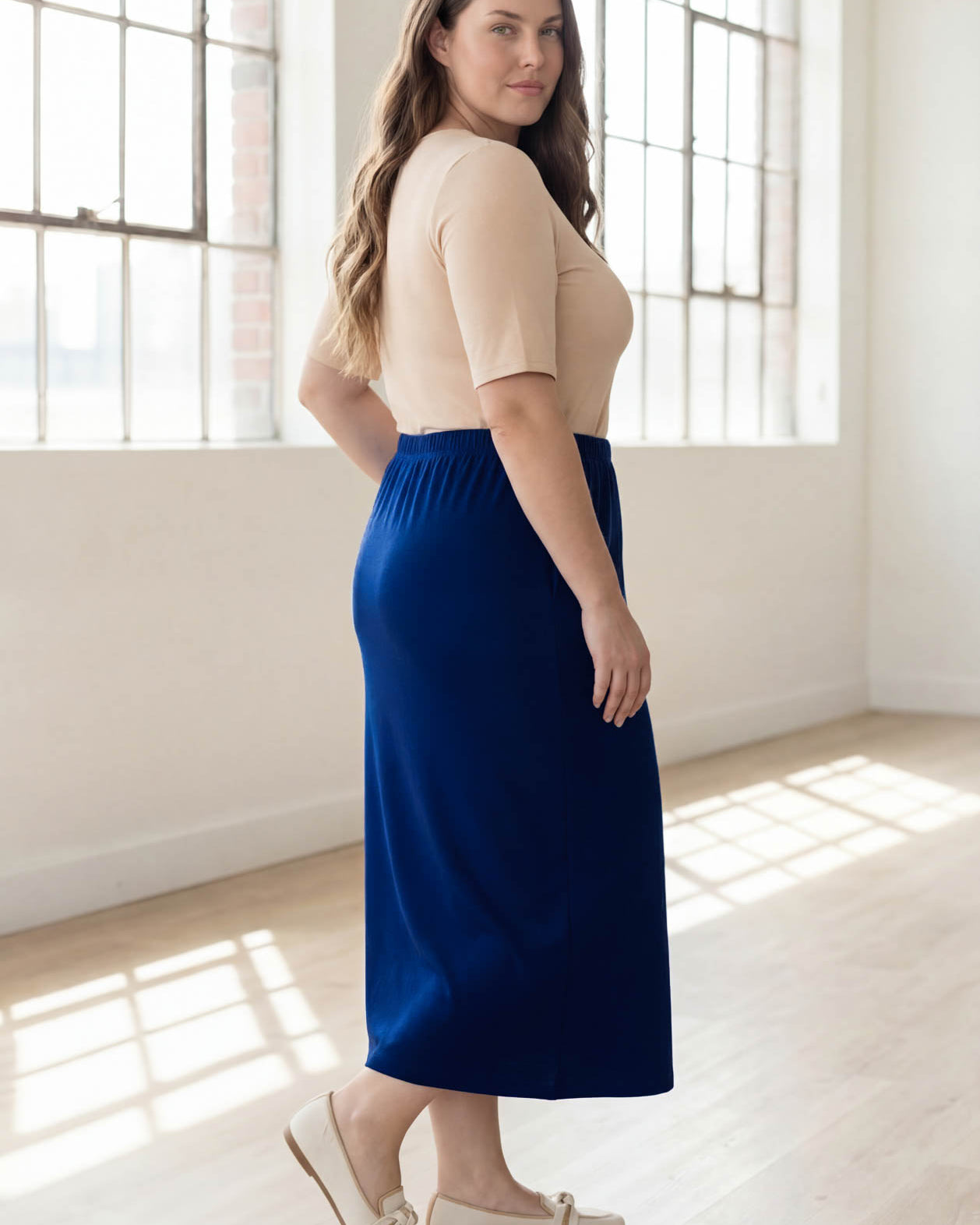 Model wearing Nuggles® 34" Classic Skirt in Dark Royal