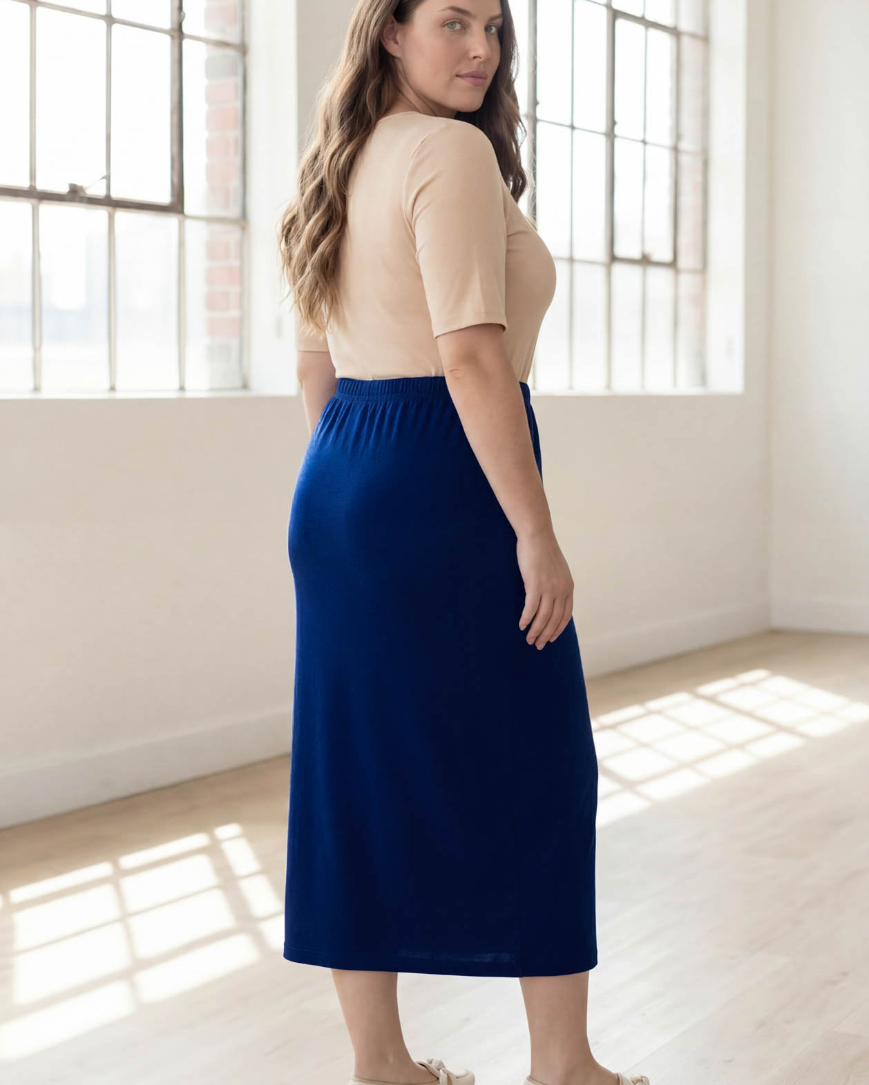 Model wearing Nuggles® 34" Classic Skirt in Dark Royal