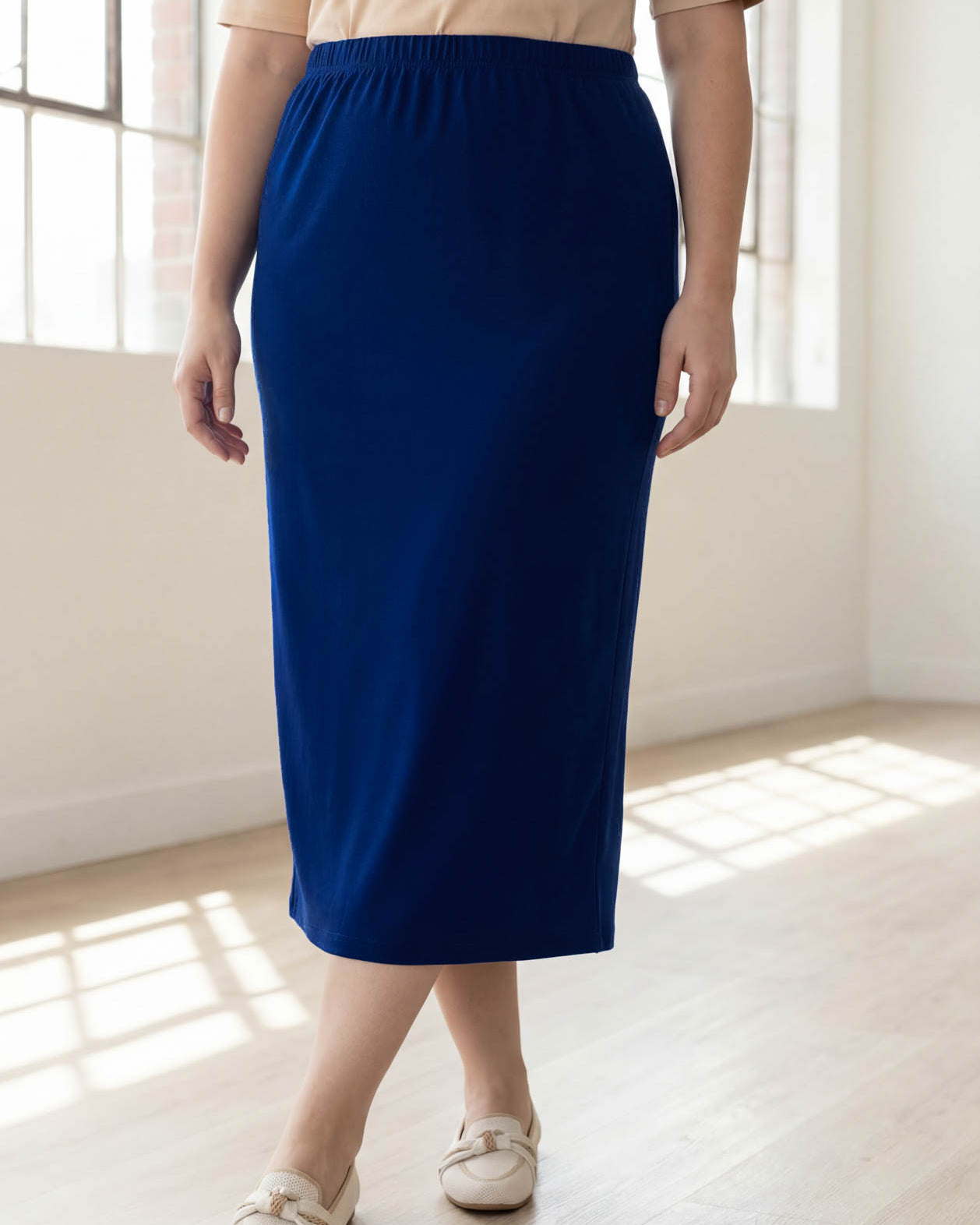 Model wearing Nuggles® 34" Classic Skirt in Dark Royal