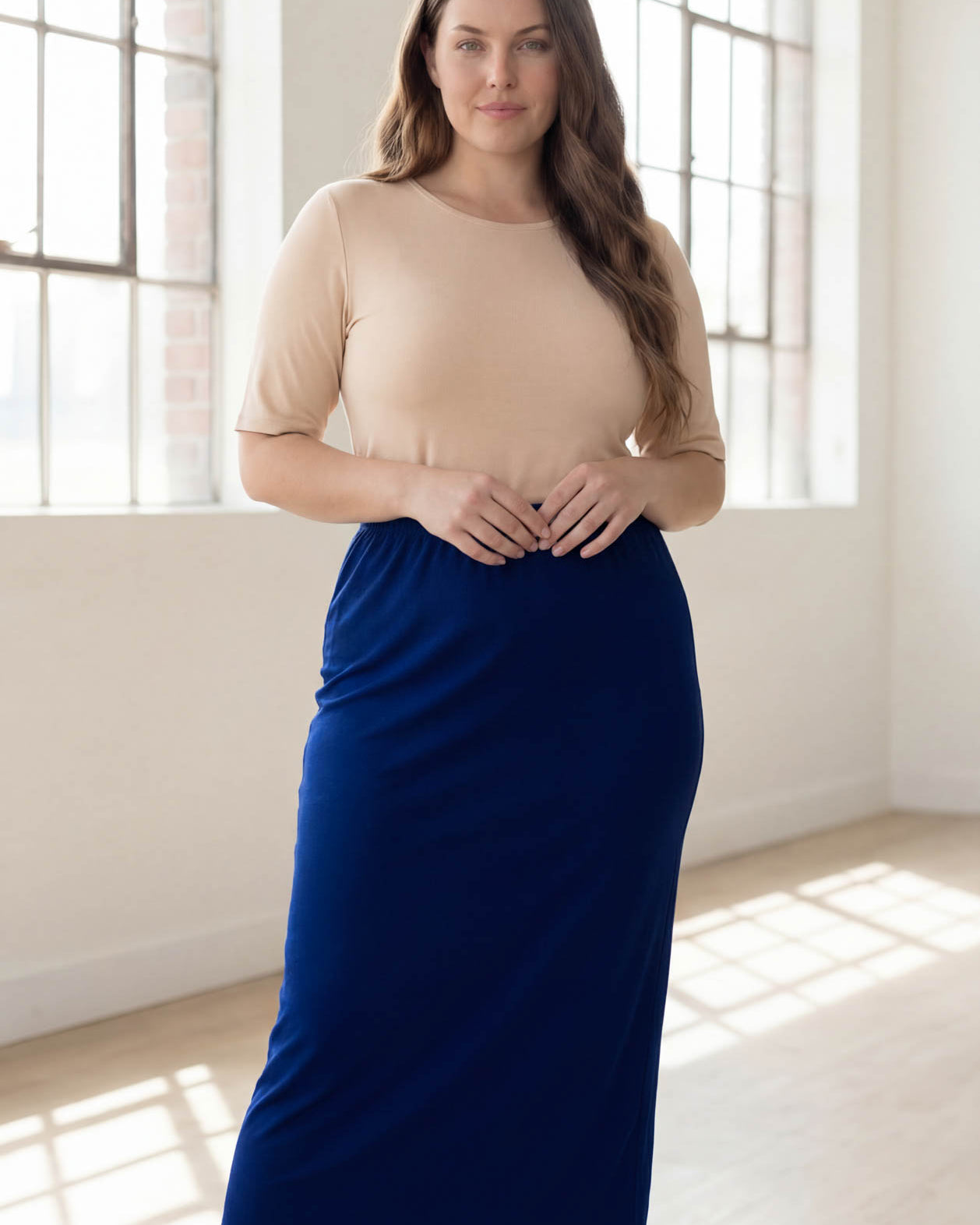 Model wearing Nuggles® 34" Classic Skirt in Dark Royal