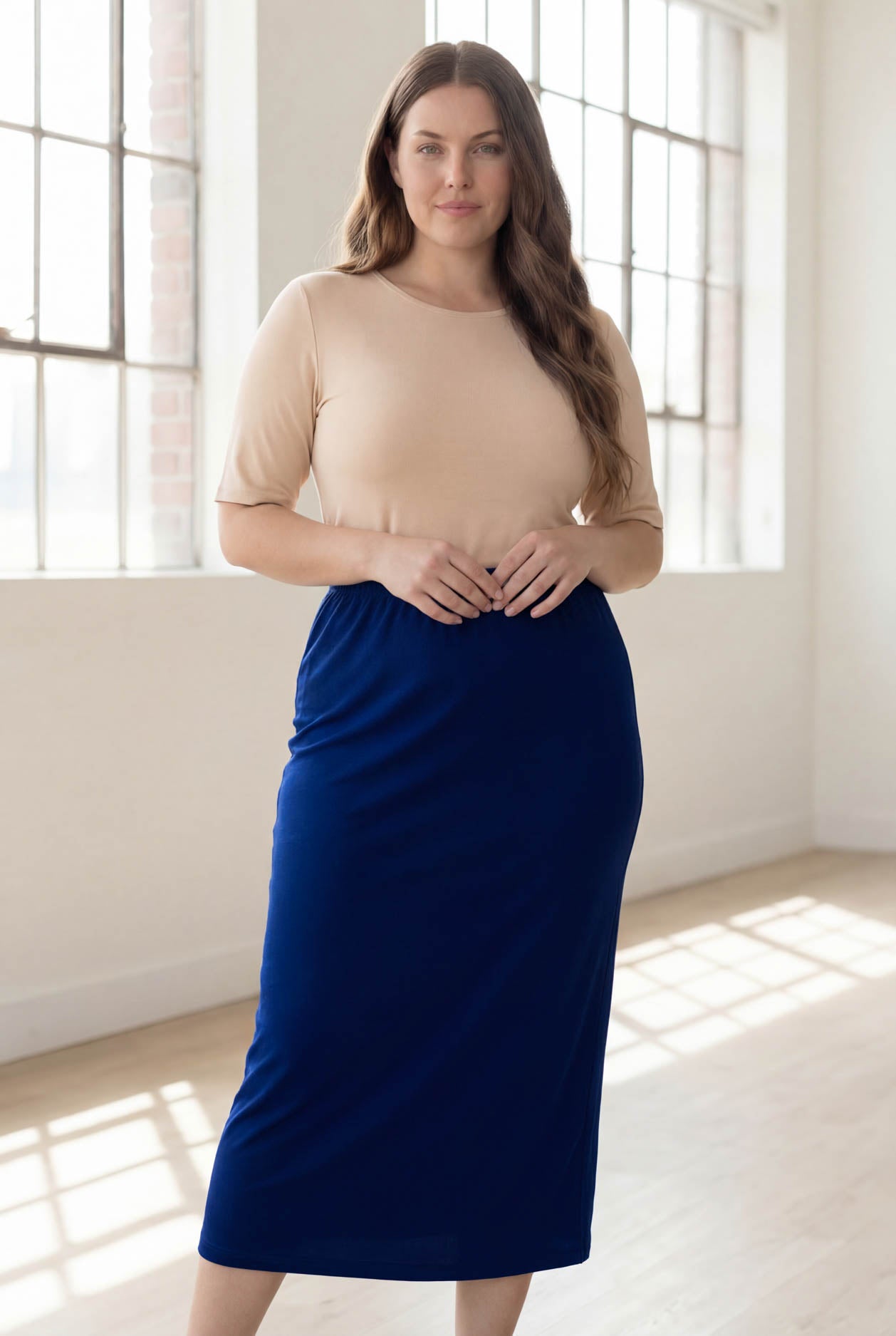 Model wearing Nuggles® 34" Classic Skirt in Dark Royal