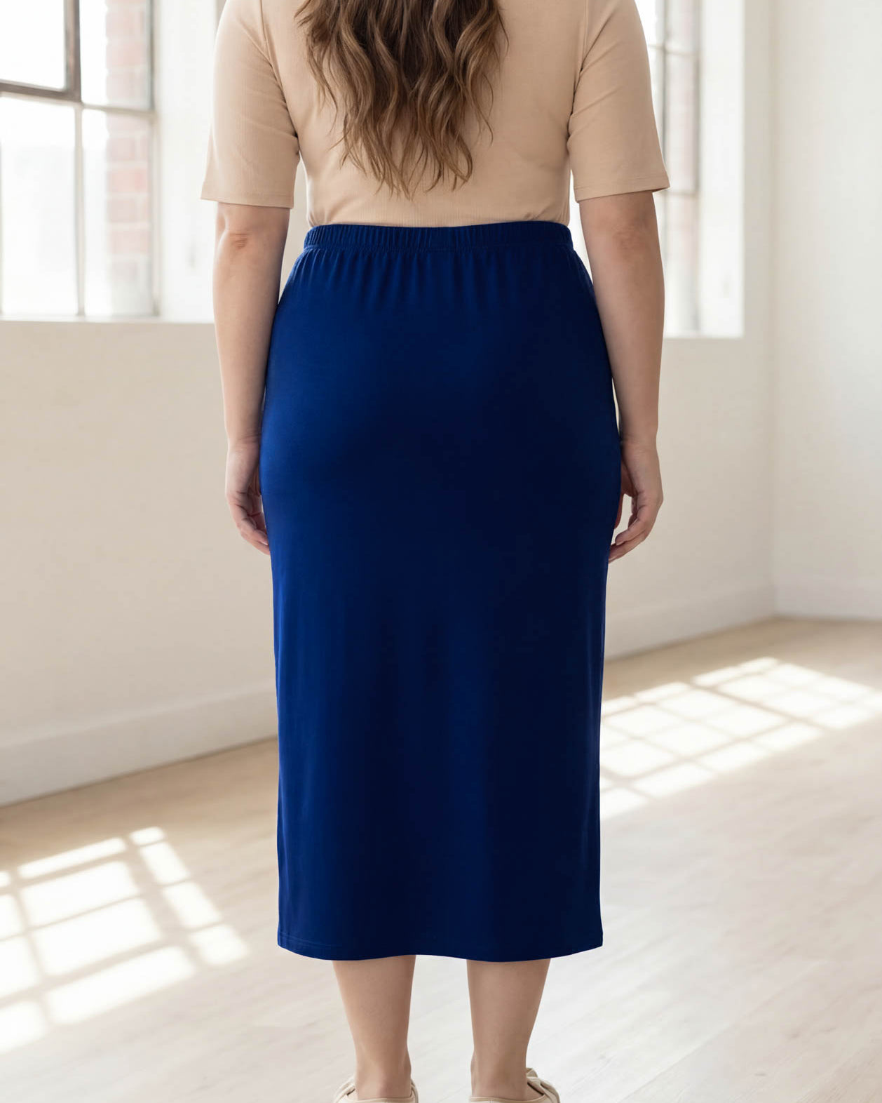 Model wearing Nuggles® 34" Classic Skirt in Dark Royal