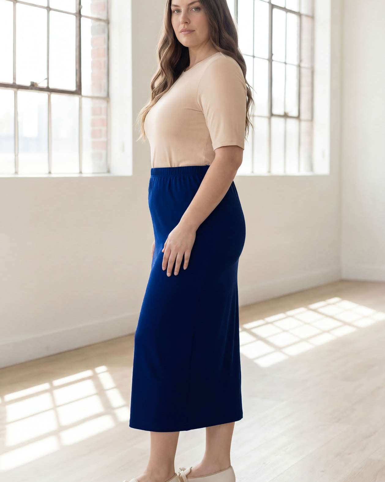 Model wearing Nuggles® 34" Classic Skirt in Dark Royal