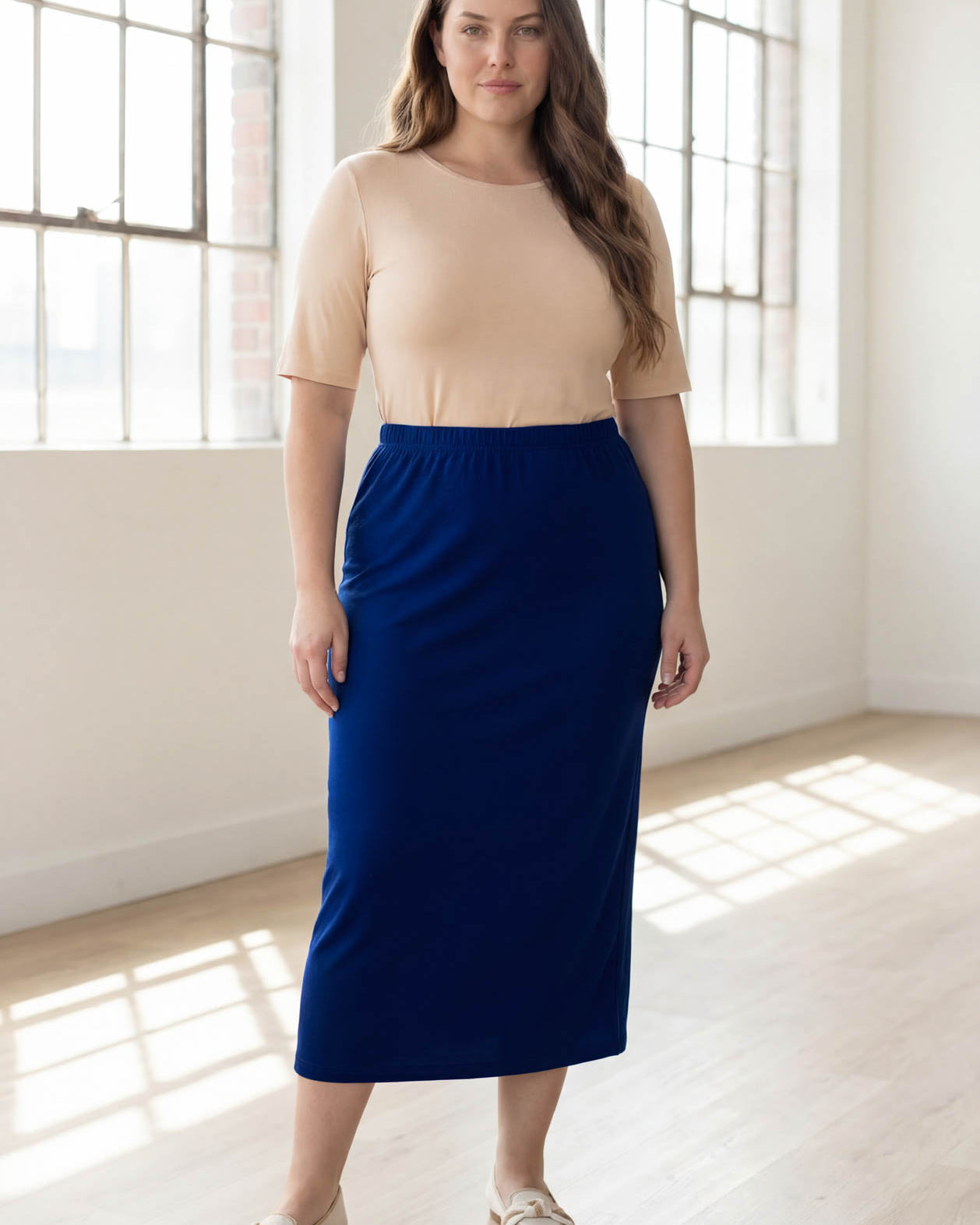Model wearing Nuggles® 34" Classic Skirt in Dark Royal