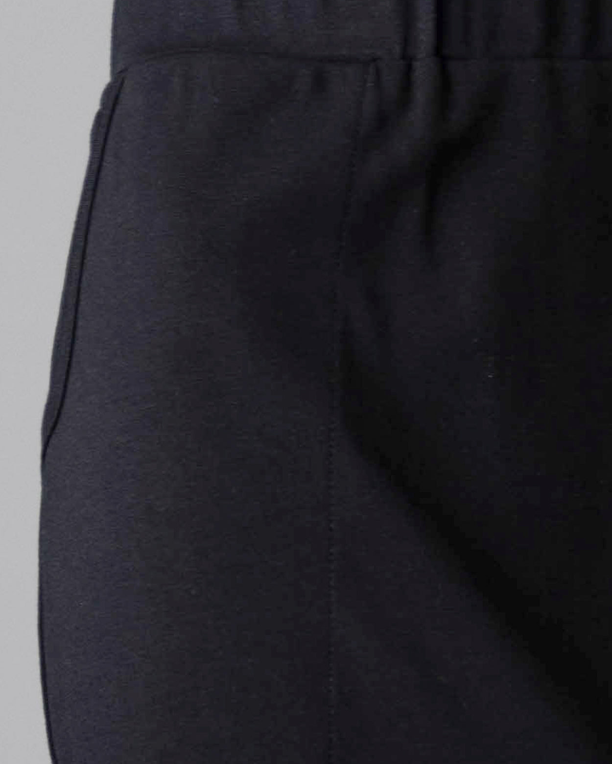 Model wearing Nuggles® 34" Pocket Classic Skirt in Black
