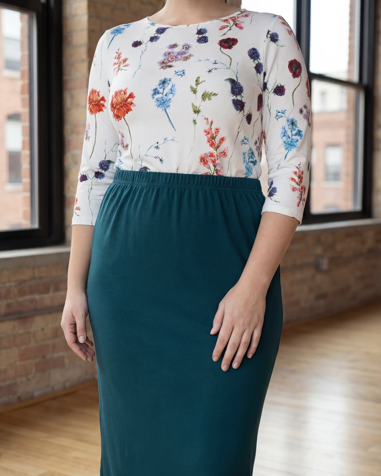 Model wearing Nuggles® 34" Classic Skirt in Teal Green