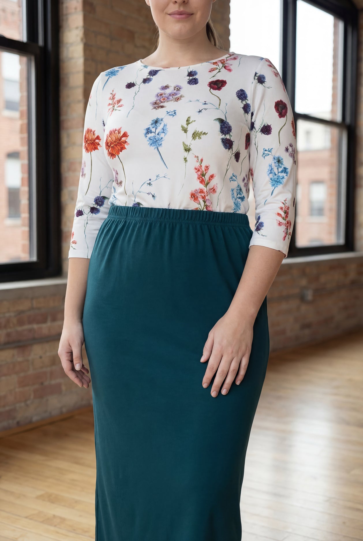 Model wearing Nuggles® 34" Classic Skirt in Teal Green
