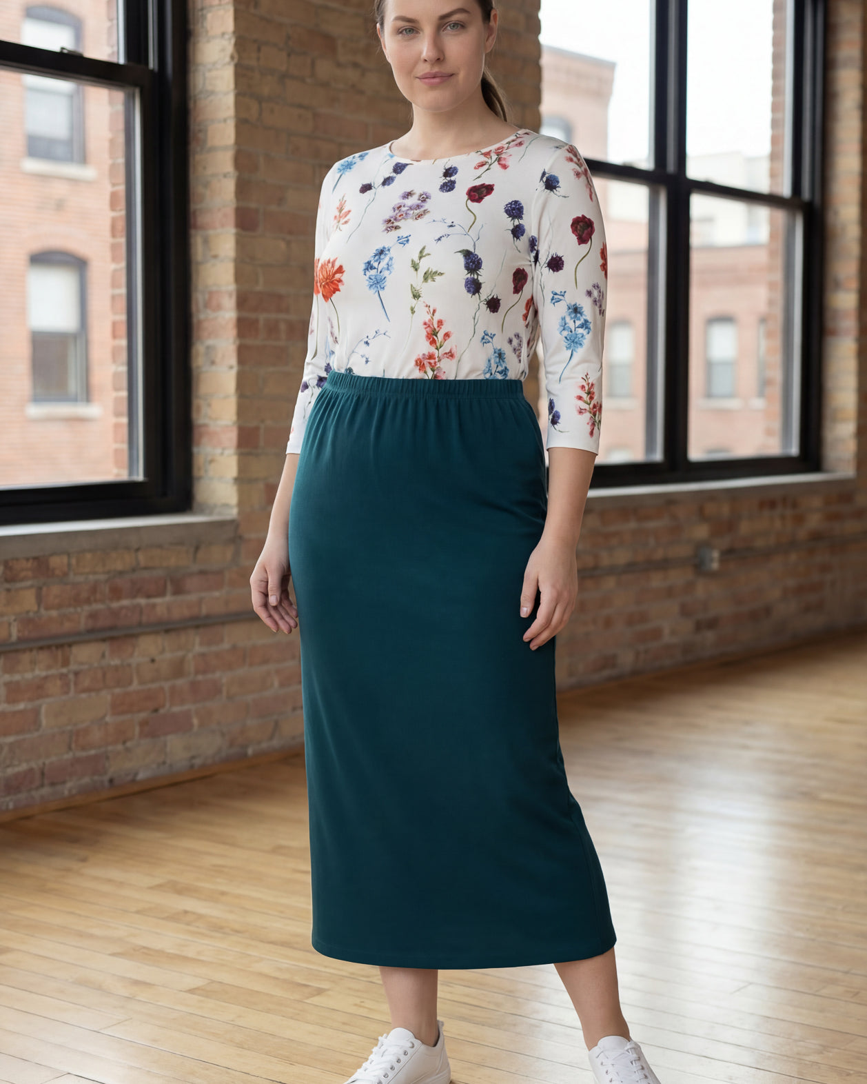 Model wearing Nuggles® 34" Classic Skirt in Teal Green