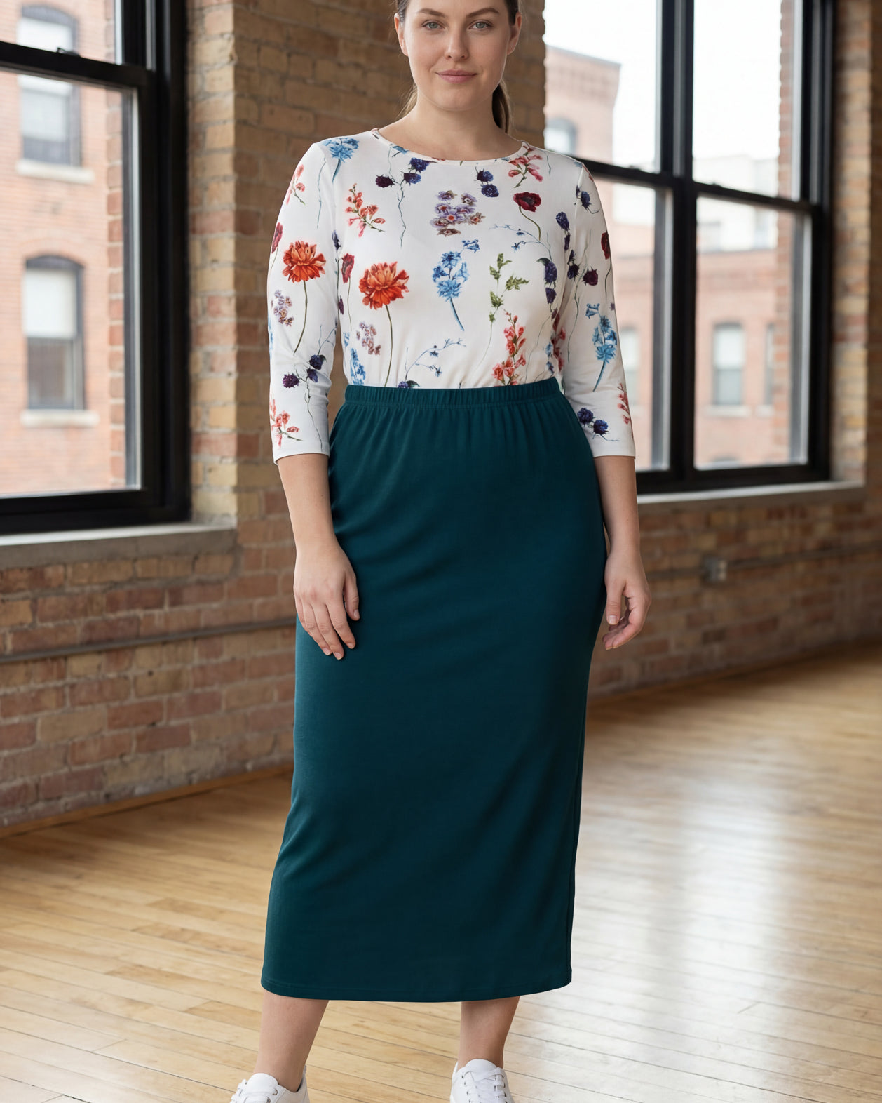 Model wearing Nuggles® 34" Classic Skirt in Teal Green