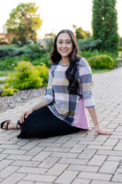 Model wearing the Adrielle Top with 3/4 sleeves and a classic skirt – modest women's top from Nuggles®