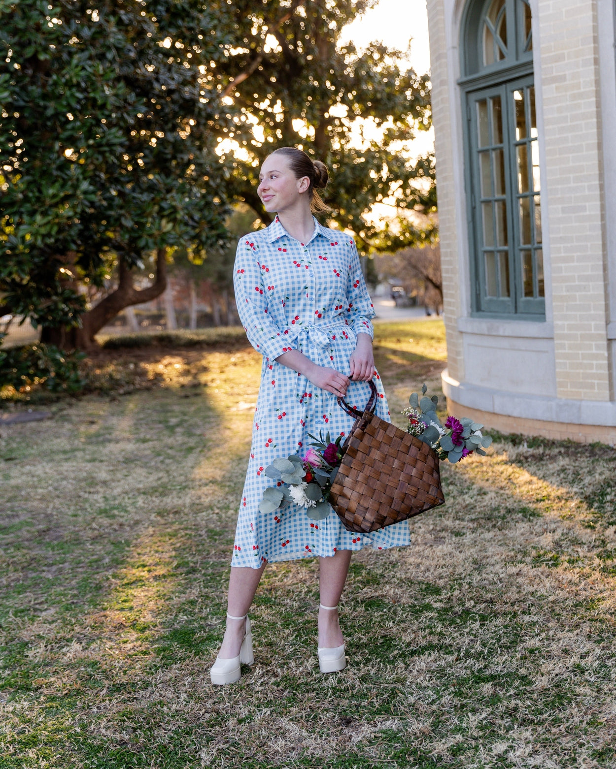 Model wearing the Nuggles® Rachel Dress in Sweet Cherry Check