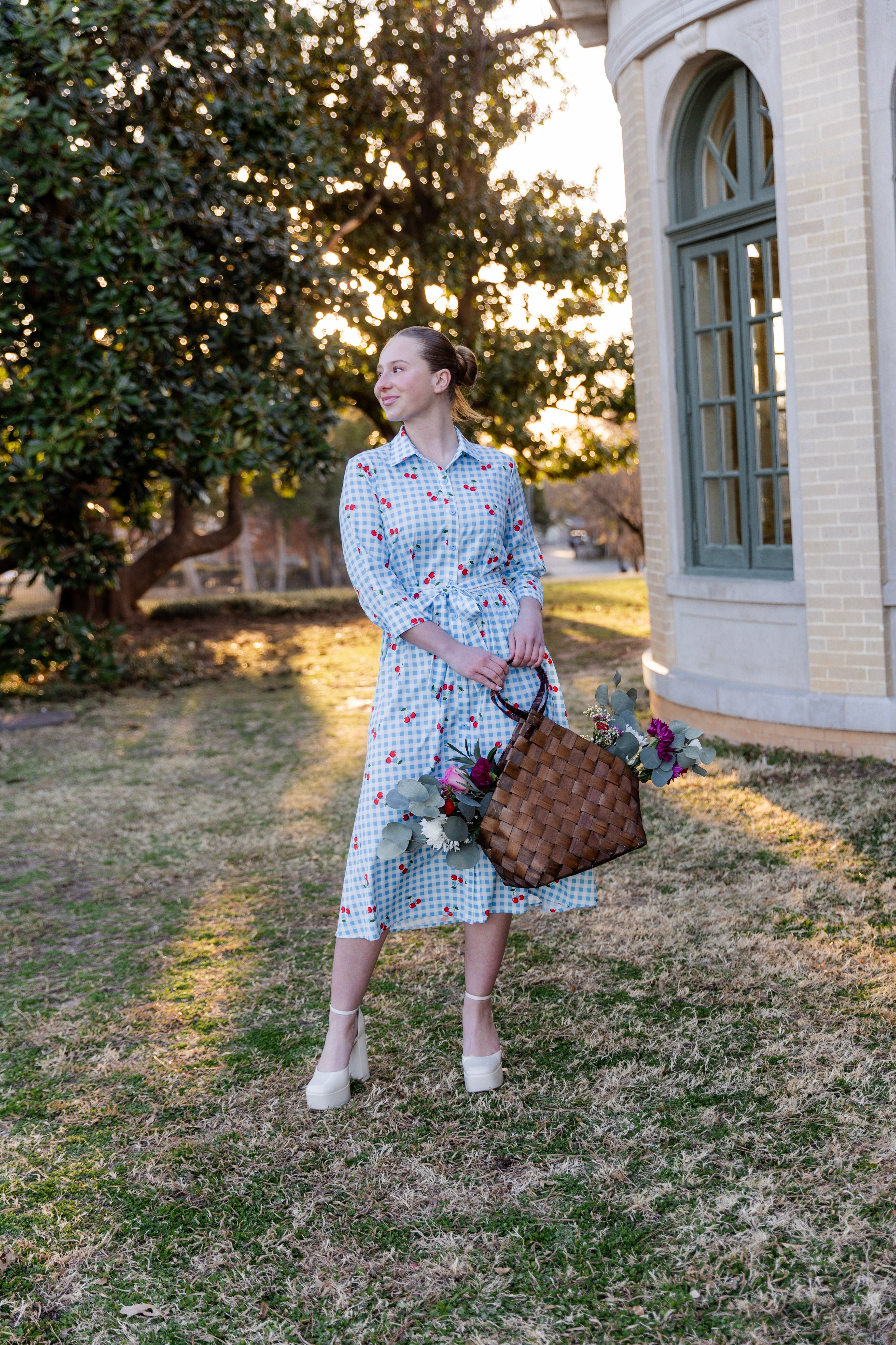 Model wearing the Nuggles® Rachel Dress in Sweet Cherry Check