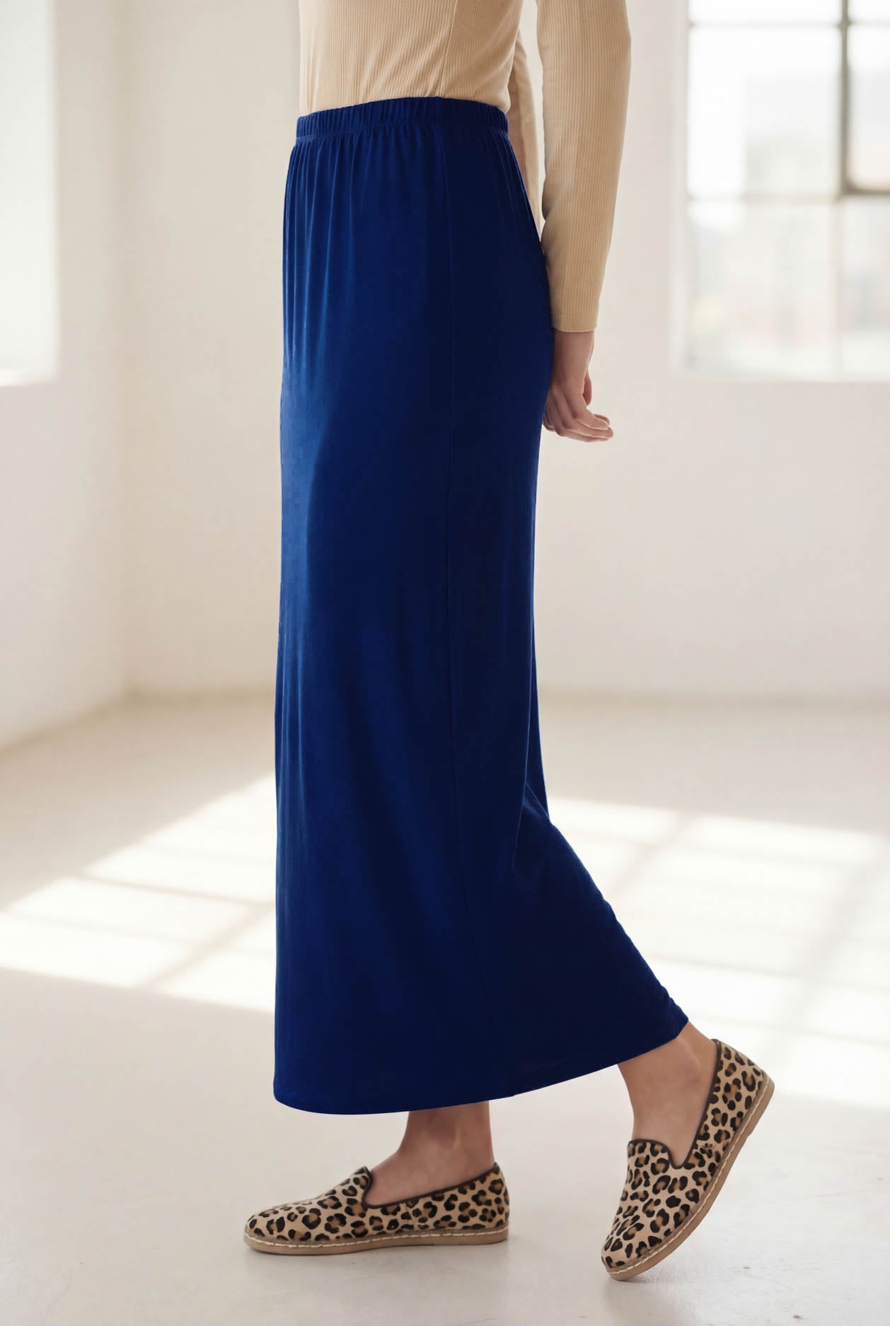 Model wearing Nuggles® 36" Classic Skirt in Dark Royal